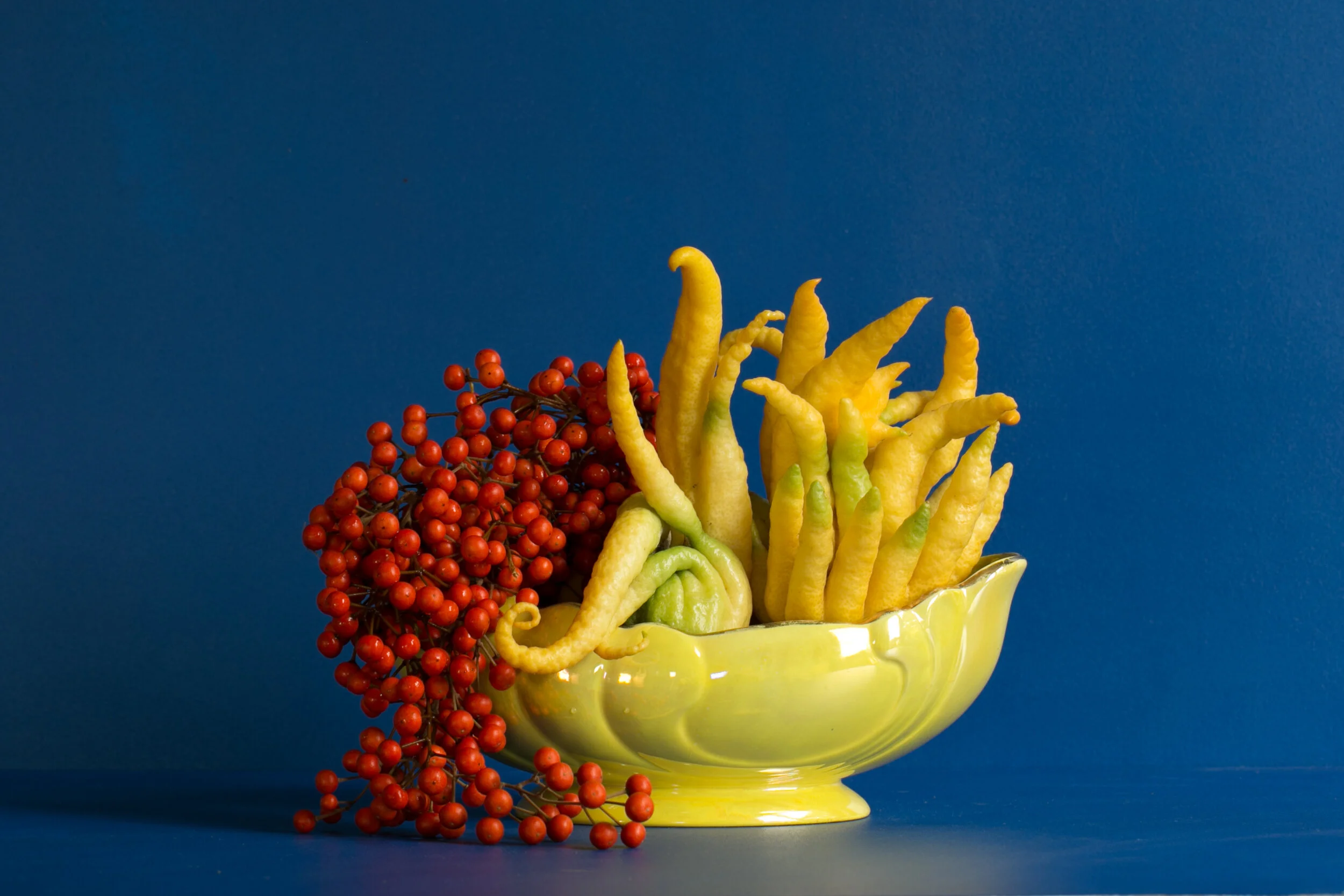 Yellow Buddha Hands Red Berry