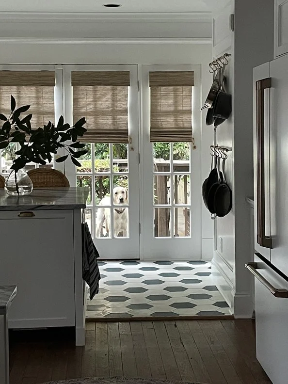 kitchen design, checkerboard tile, dog, natural shades, Laura W. Jenkins Interiors