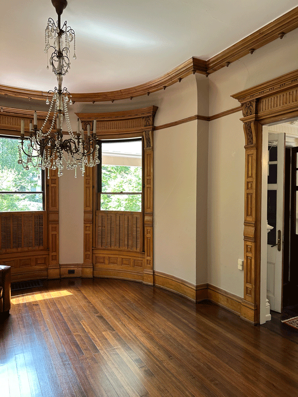 A chandelier in an empty room