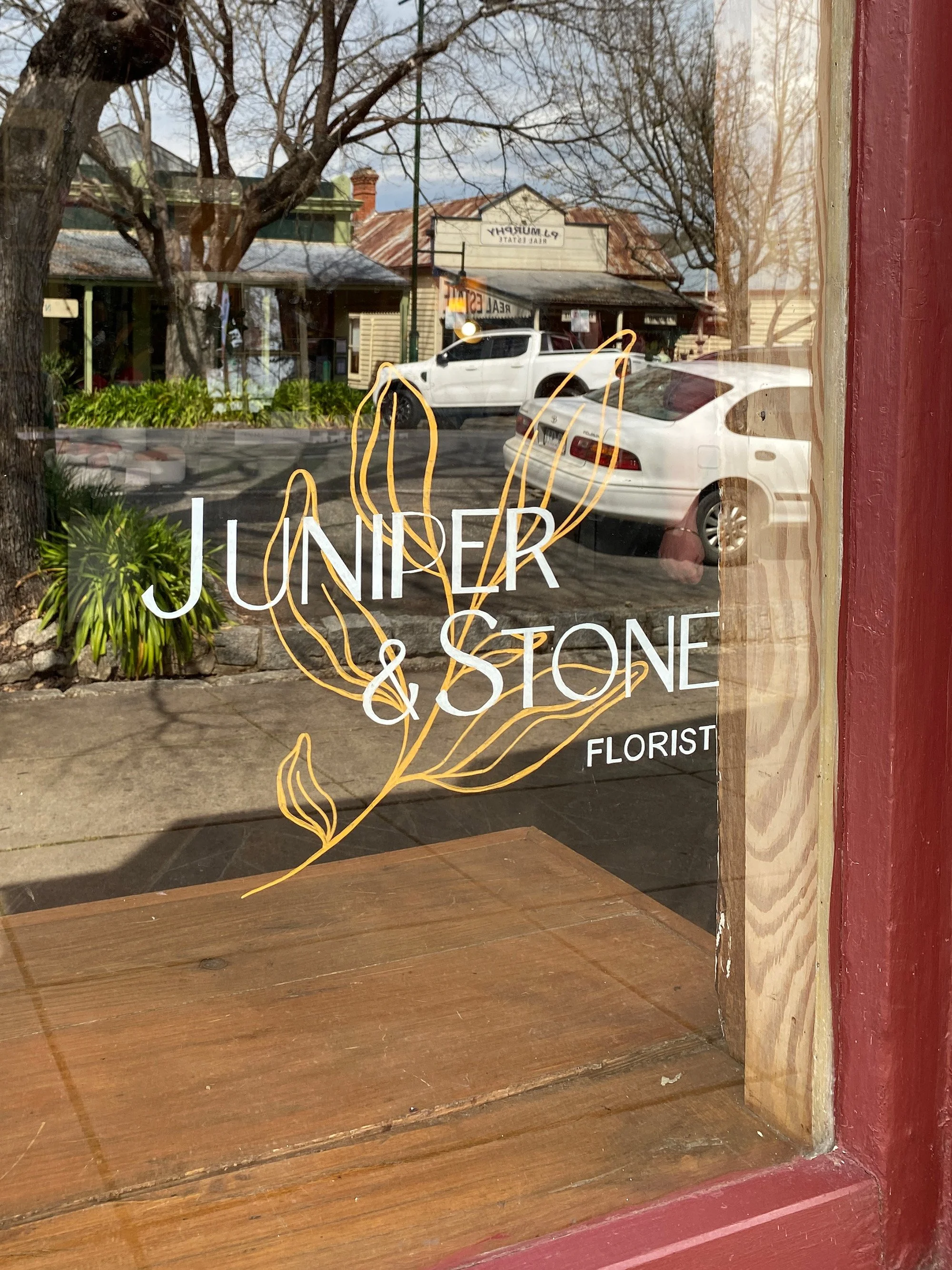 Juniper and Stone window branding