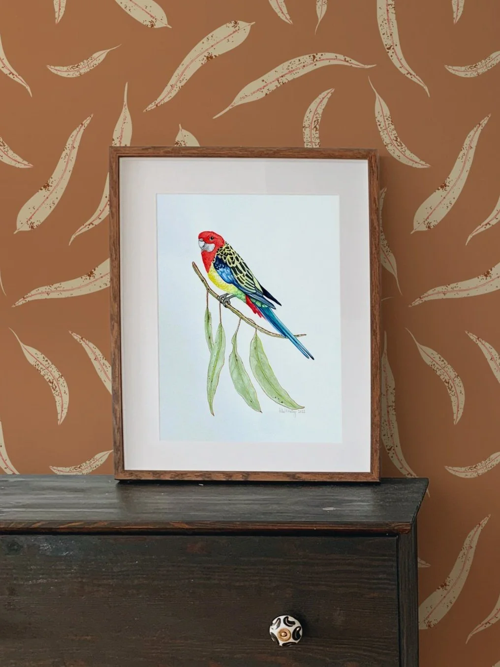 eastern-rosella-on-gum-leaf-wallpaper-Hollie-Kelley-mockup.jpg