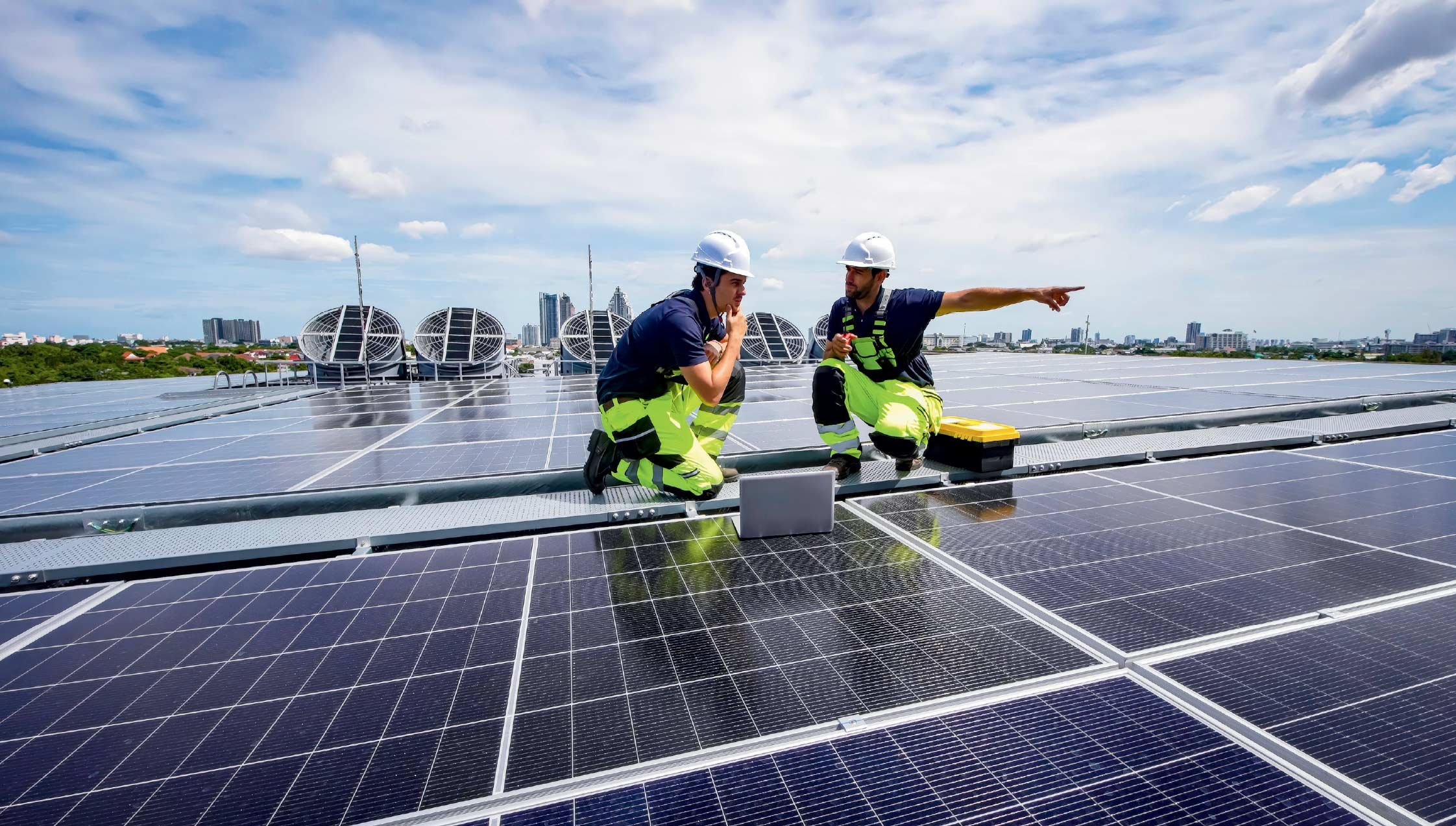 two men installing solar on the roof