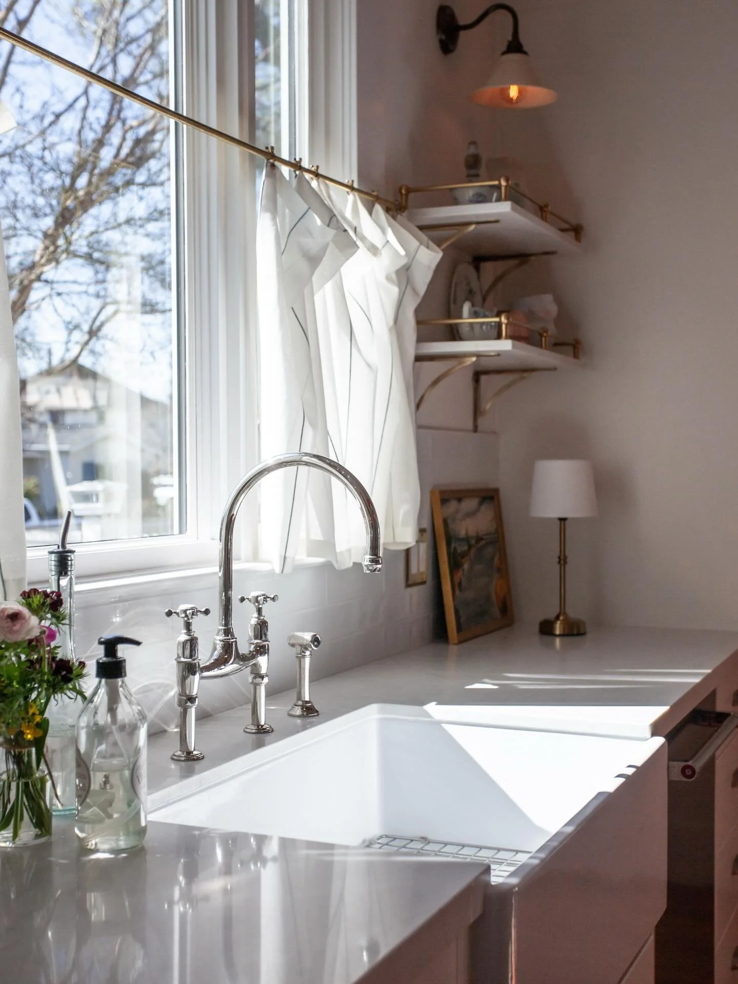 More details from this delectable kitchen designed by Amber. Beautiful antiques, old world-style hardware, and modern function all come together to create something so impressive yet so cozy.