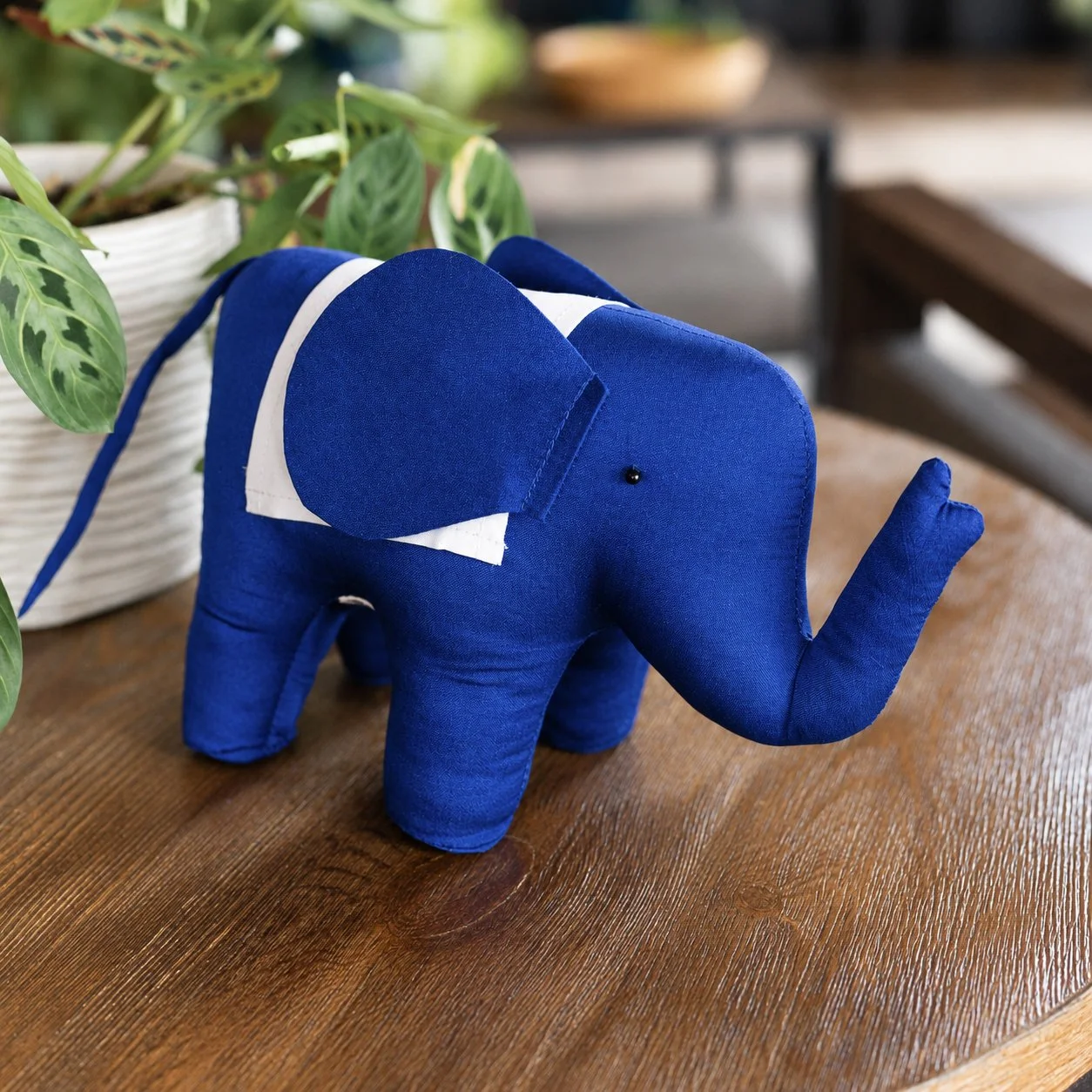 Royal Blue Elephant on Wooden Table.jpg