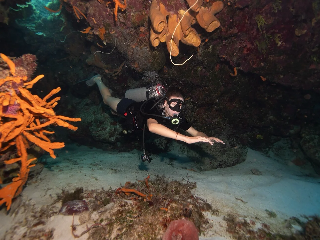 Scuba diver in Cozumel Mexico going diving in a cavern