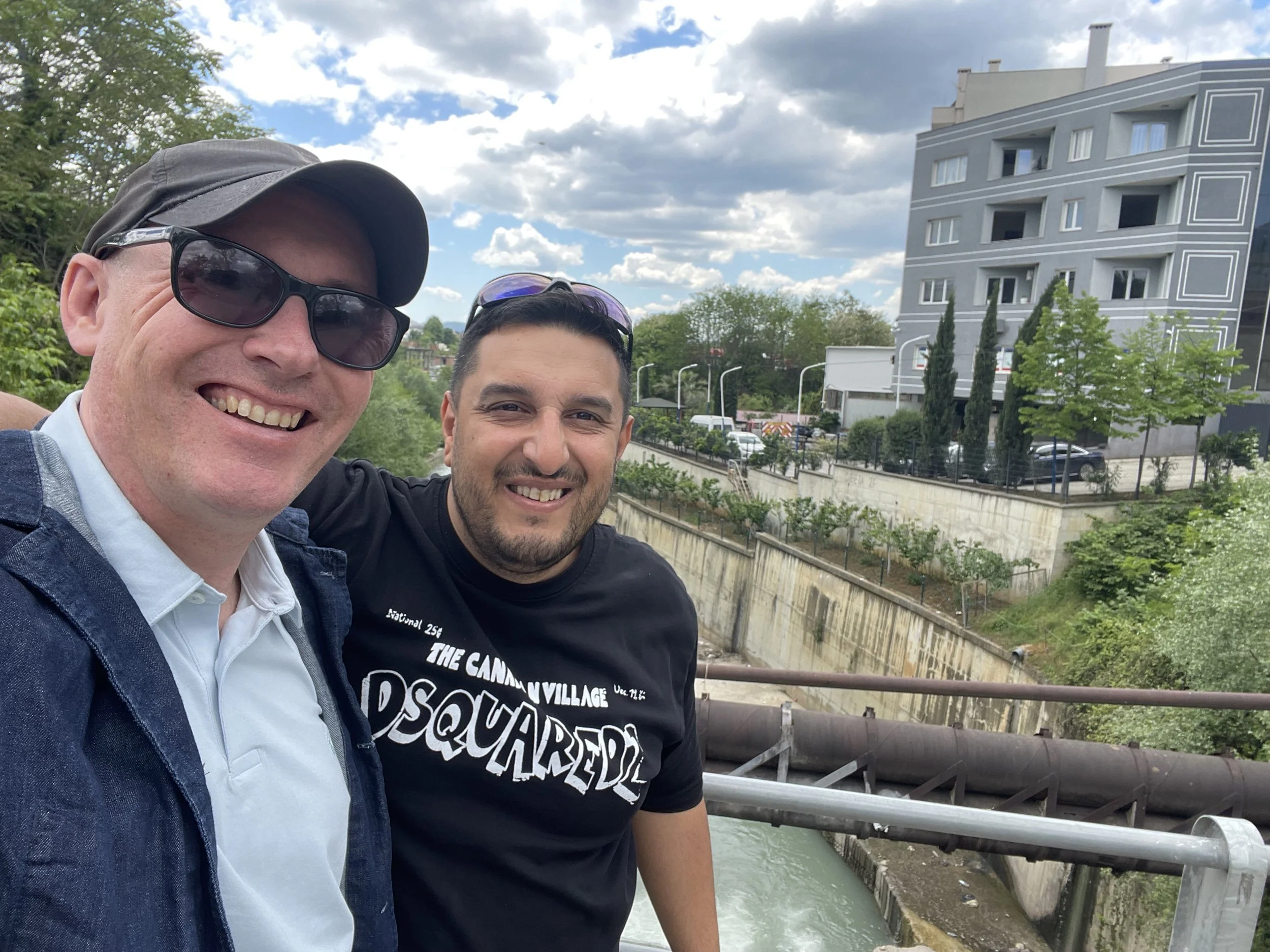 Dan Dupree and Pastor Juri Arapi at the bridge in Tirana