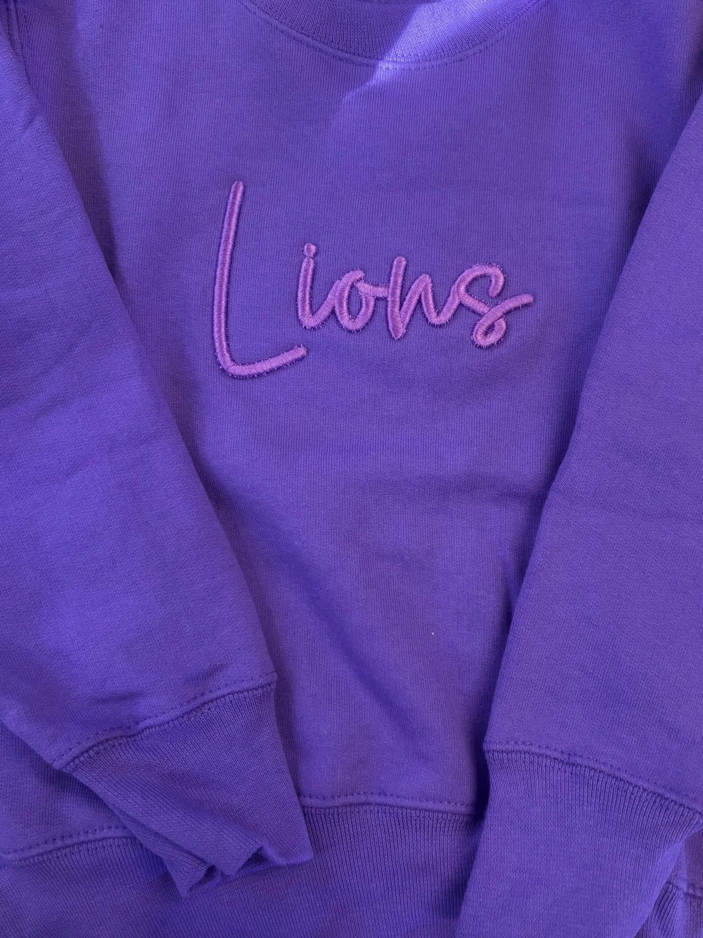 Purple crewneck. Youth sizes XS- XL