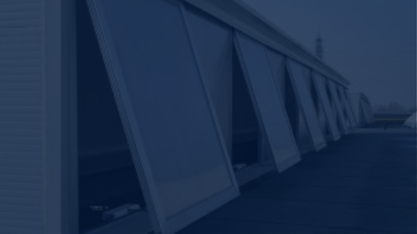 A blurred image of an Open bank of windows using electric actuators 