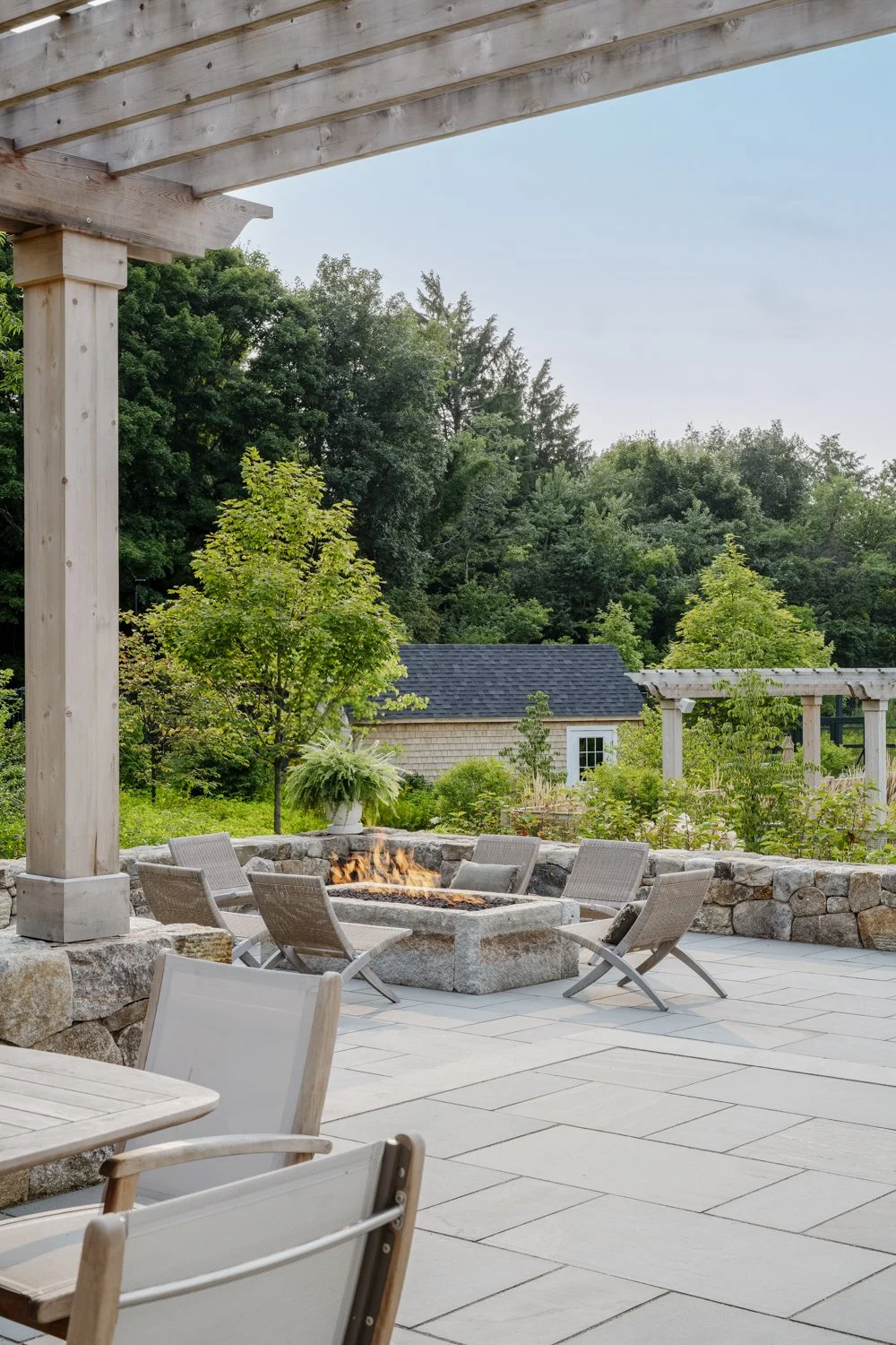 best landscape designer near boston, best landscape architect near boston, best pool company near boston, best pool installation, best landscape design in new england, custom trellis, blackeyed susans, custom landscape design, granite firepit