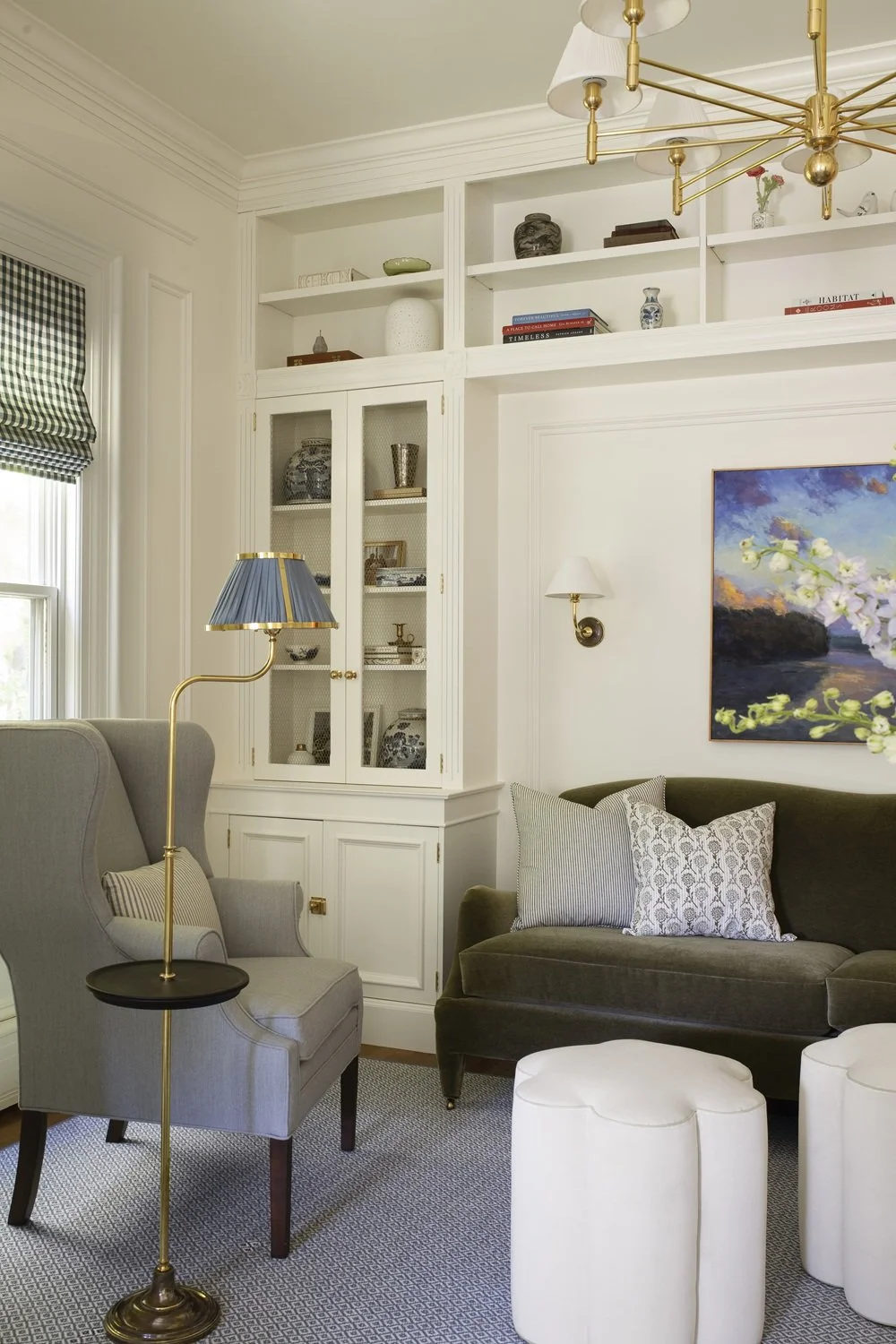 Sherborn living room with green sofas and built-in bookcases, scalloped coffee table, historic design, traditional design, classic design