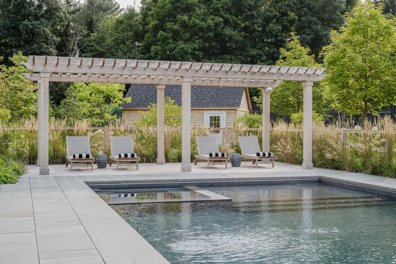 best landscape designer near boston, best landscape architect near boston, best pool company near boston, best pool installation, best landscape design in new england, custom trellis, blackeyed susans, custom landscape design, pool with spa