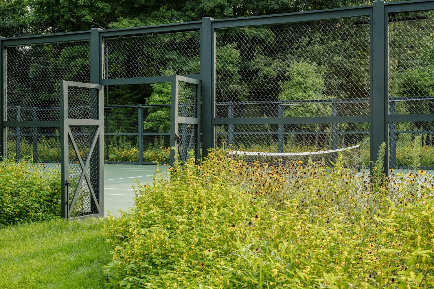 best landscape designer near boston, best landscape architect near boston, best pool company near boston, best pool installation, best landscape design in new england, custom trellis, blackeyed susans, custom landscape design, tennis court