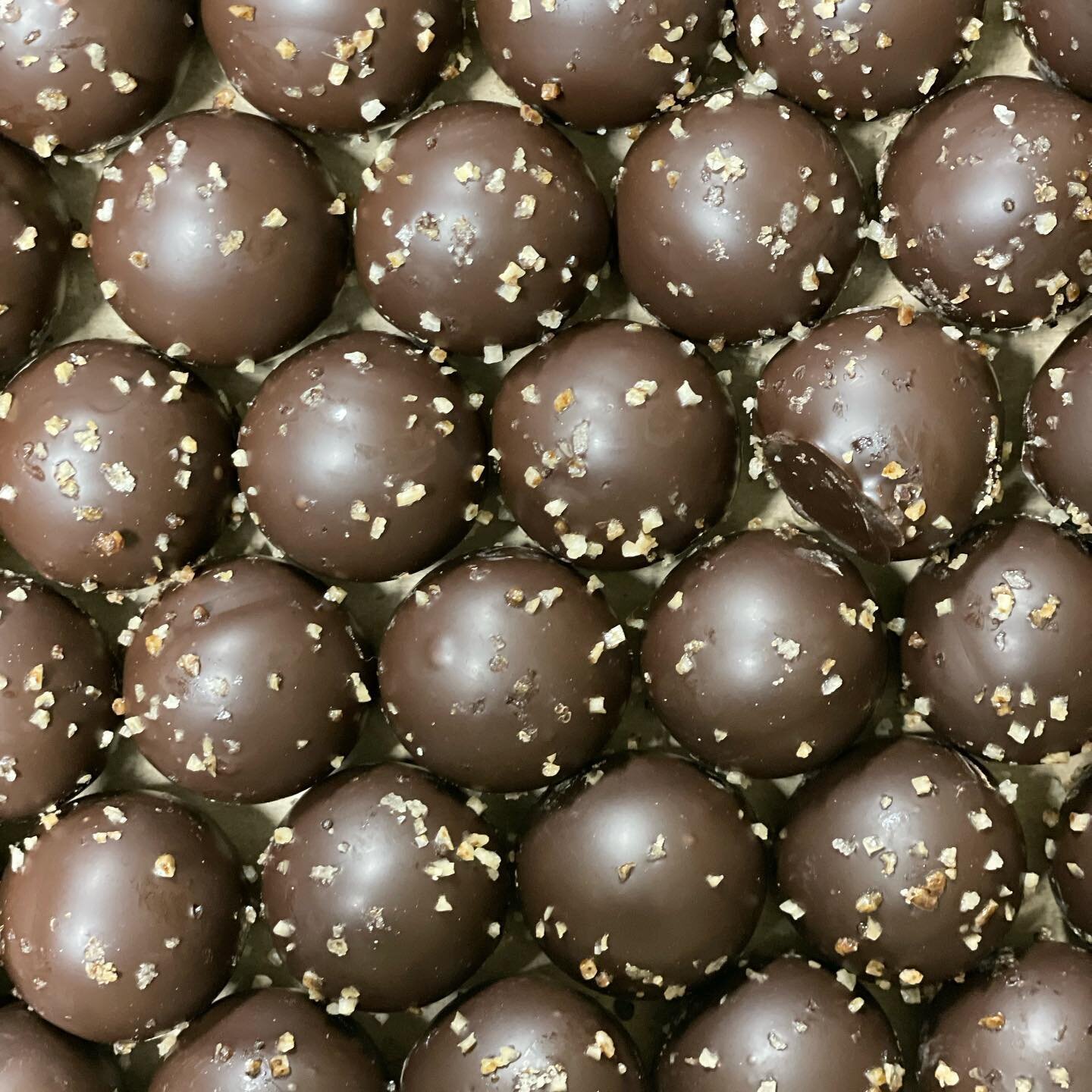 They&rsquo;re Back!!! Chipotle Chili Caramel Truffles 🌶 the perfect amount of heat to sweet #hollandpeanutstore #familybusiness #oneholland #downtownholland #downtownhollandmi #hollandmi #hollandmichigan #chocolate #truffles #chipotletruffles #shops