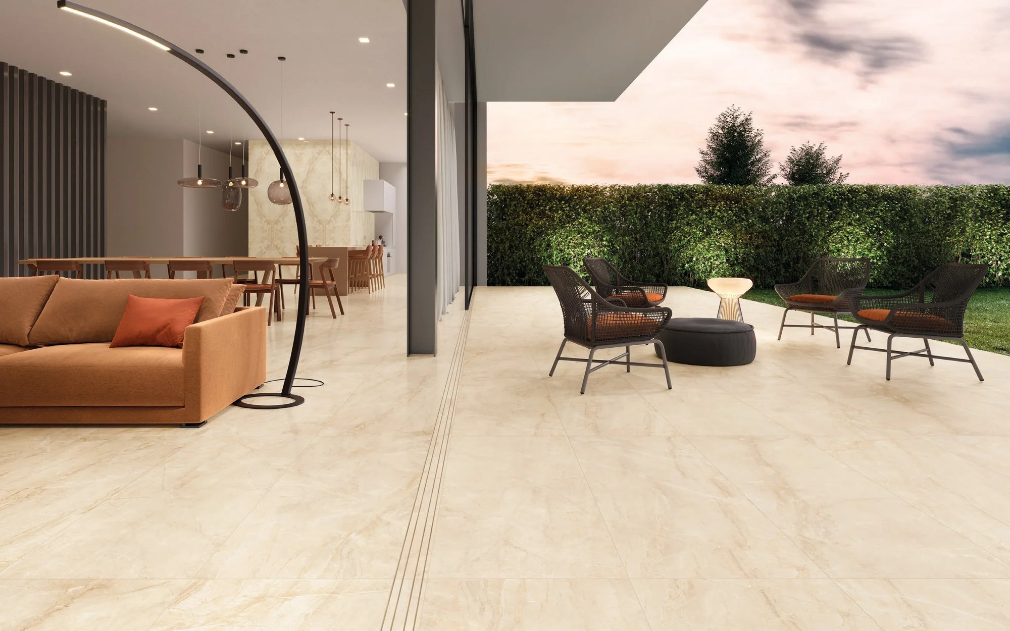 Porcelanato Sybil en lounge con piso continuo y jardín al fondo