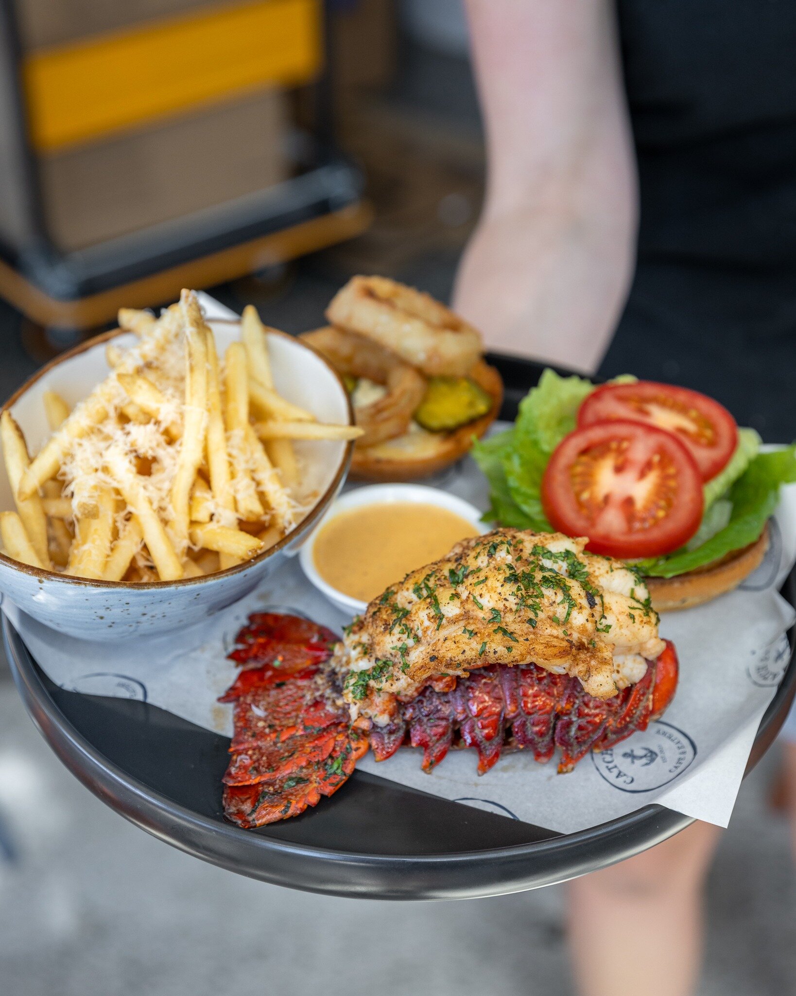 A little bit of luxury in Takapuna 🦞 Look for the Lobster Open Burger on our menu, with succulent garlic butter lobster tail, bread &amp; butter pickles, tomato, lettuce, tartare sauce, onion rings, parmesan steak fries and spiced truffle hollandais