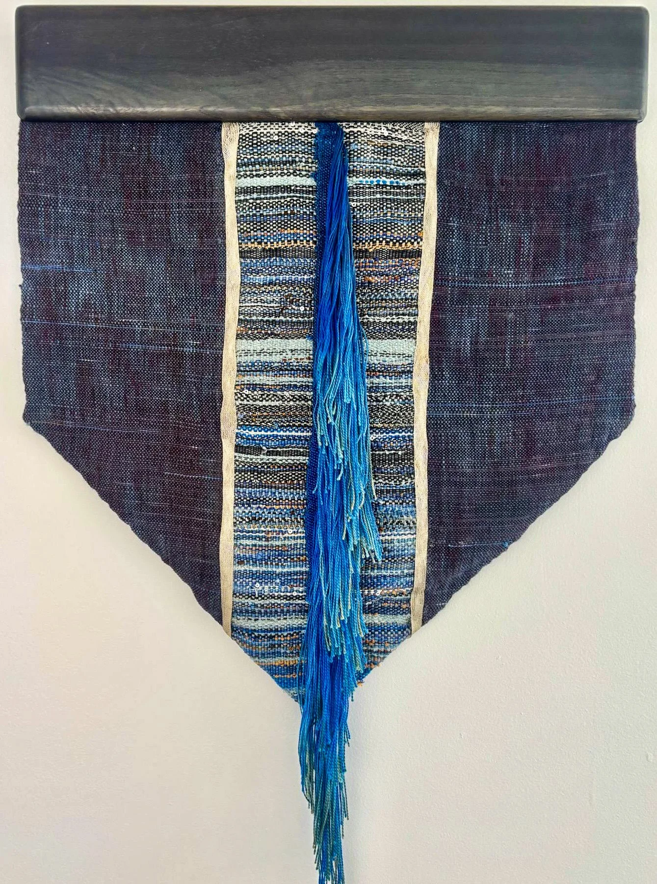 Courting the Muse. Handwoven and hand dyed textile, supplemental fringe and ribbon.  16x 21".  2025