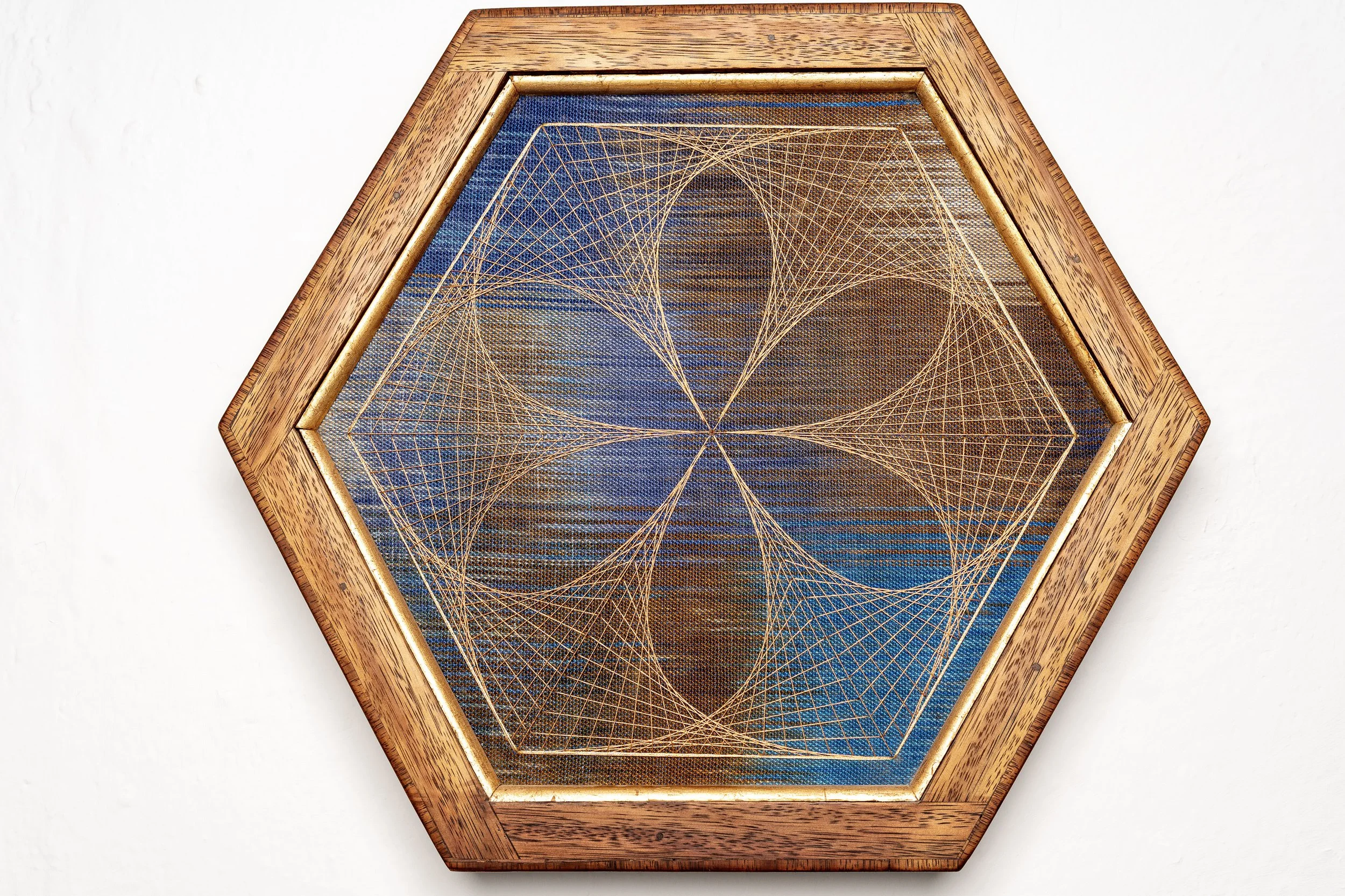 Seed of Life. Handwoven textile, metallic thread, hardwood frame.  24x24".  2025