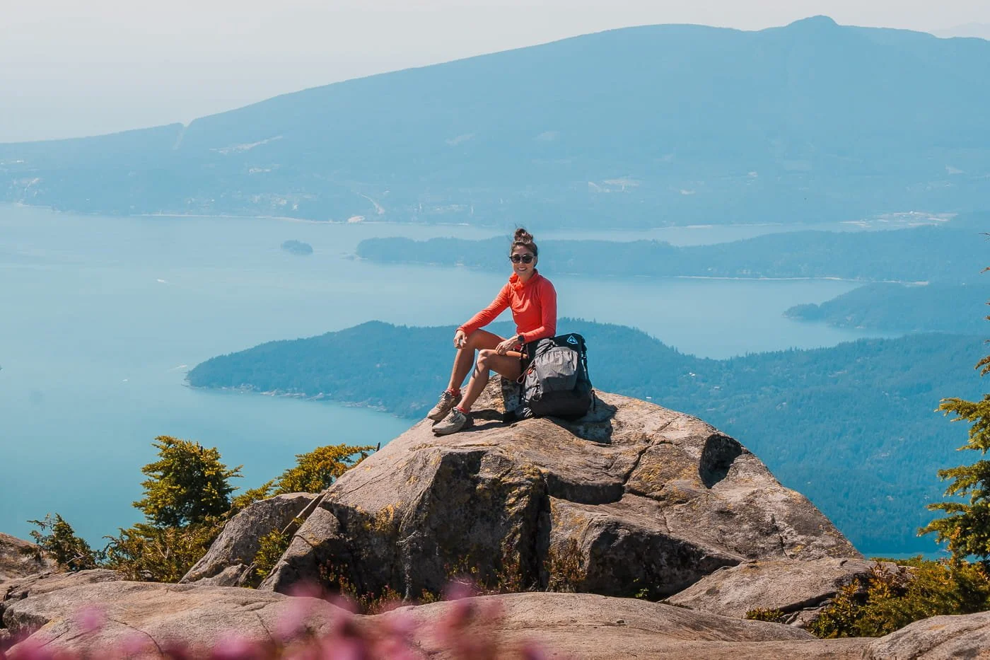 Girl sitting a top a boulder along the Howe Sound Crest Trail