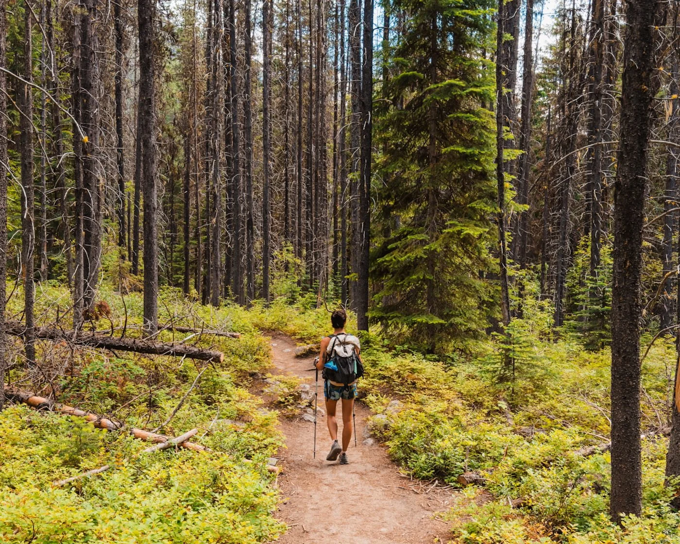 girl walking along the first mile to colchuck lake