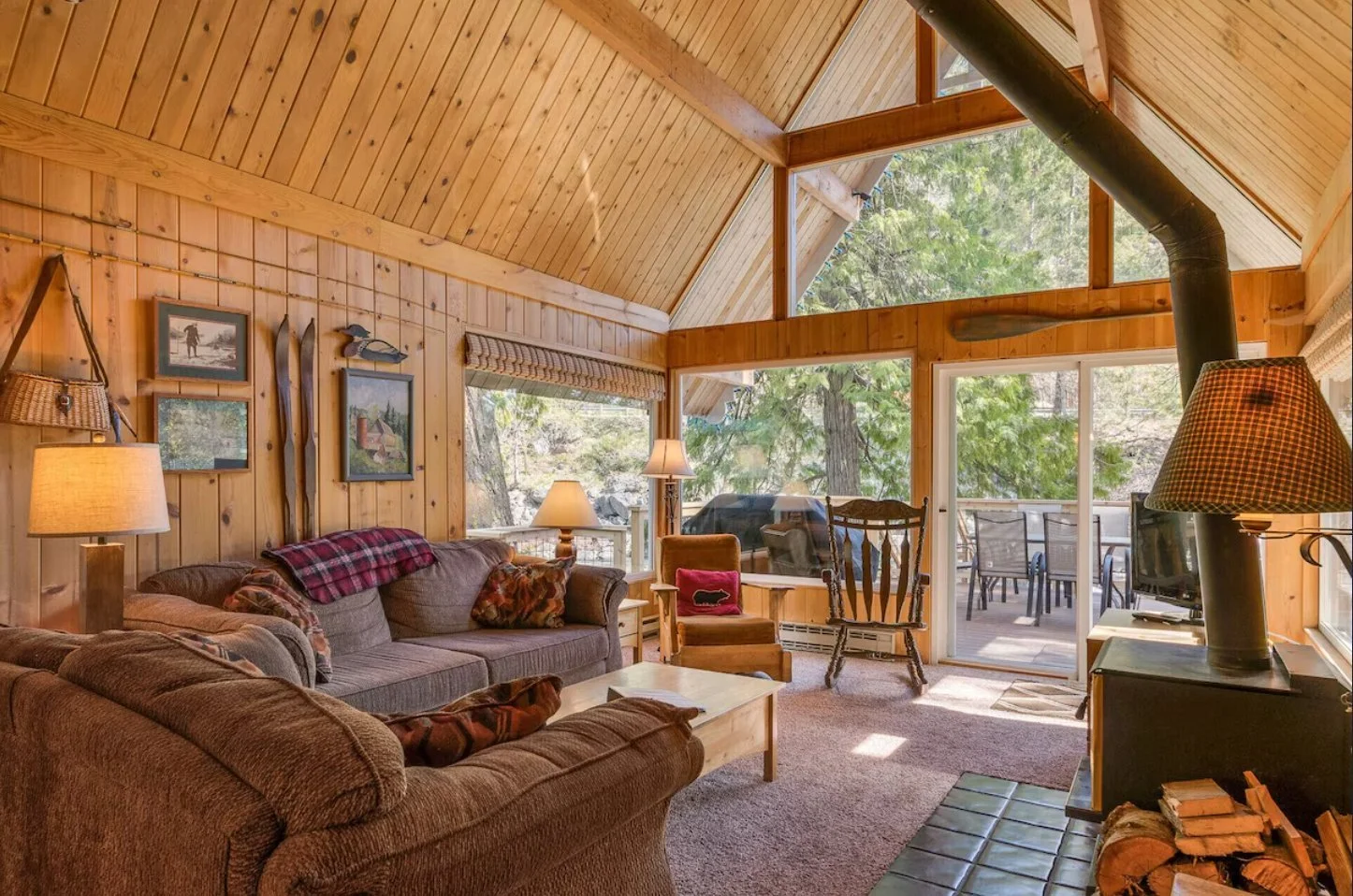 inside of a log cabin with wood walls and rustic vibes