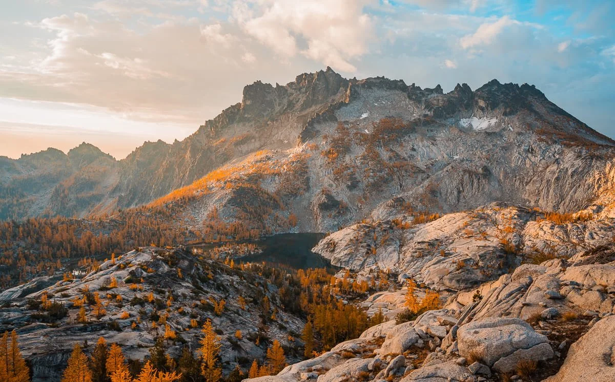 The core enchantments with golden larches all around and a blue lake with rocky peak above it