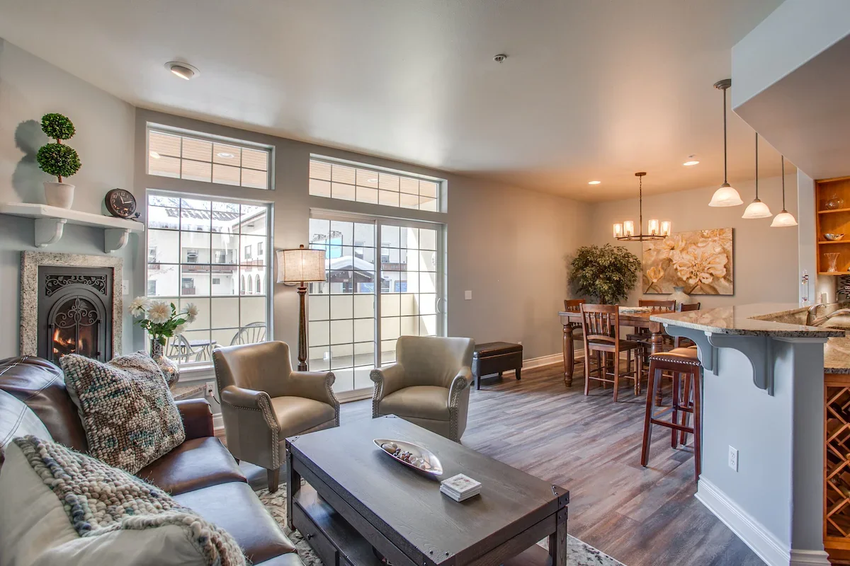 a grey living area inside of a condo in downtown leavenworth