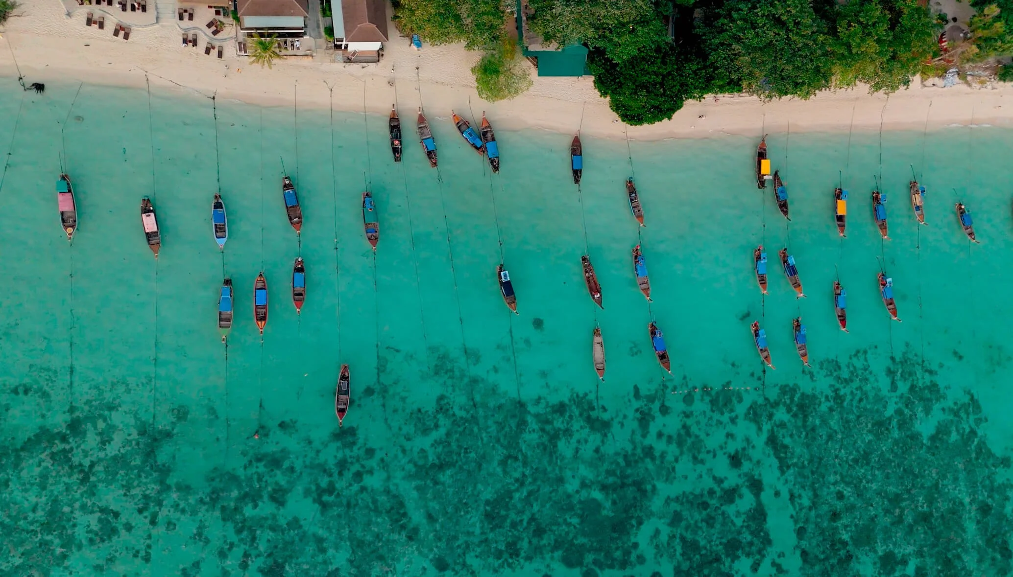 Koh Lipe beach with longtail boats
