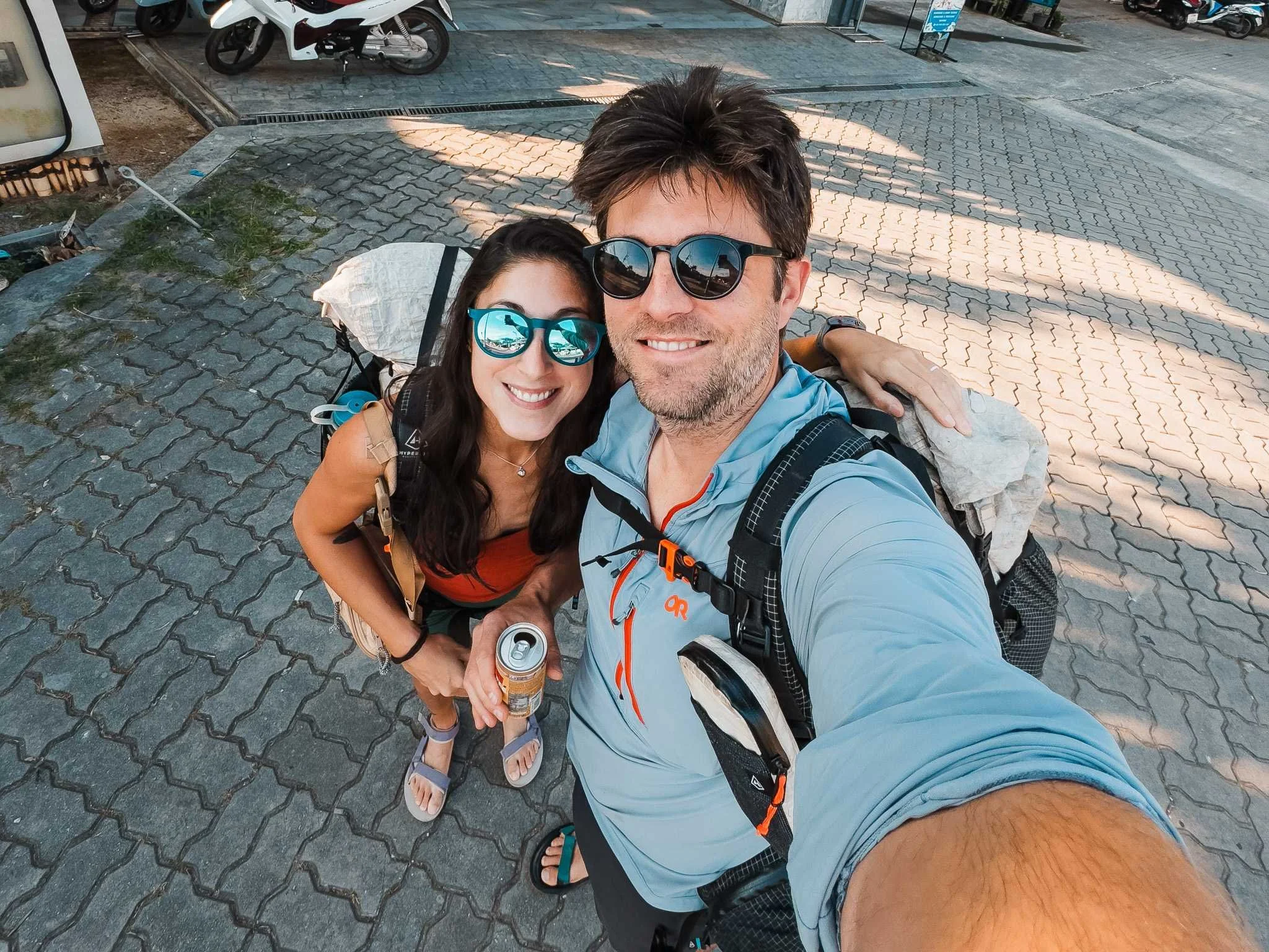 outside of our hotel in Ao Nang with our packs