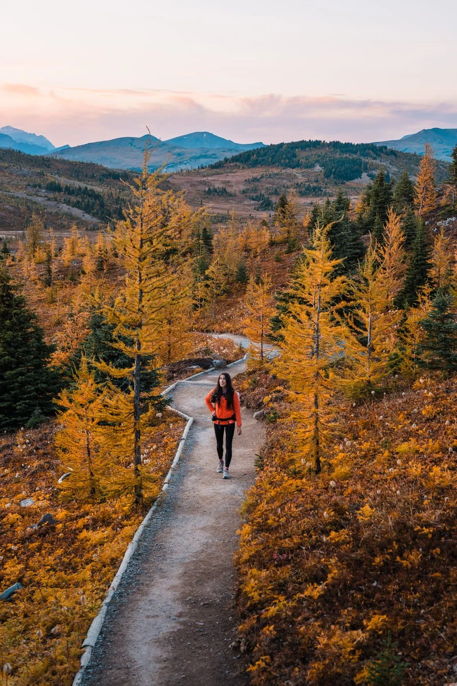 Girl hiking near Sunshine Mountain Resort during fall season