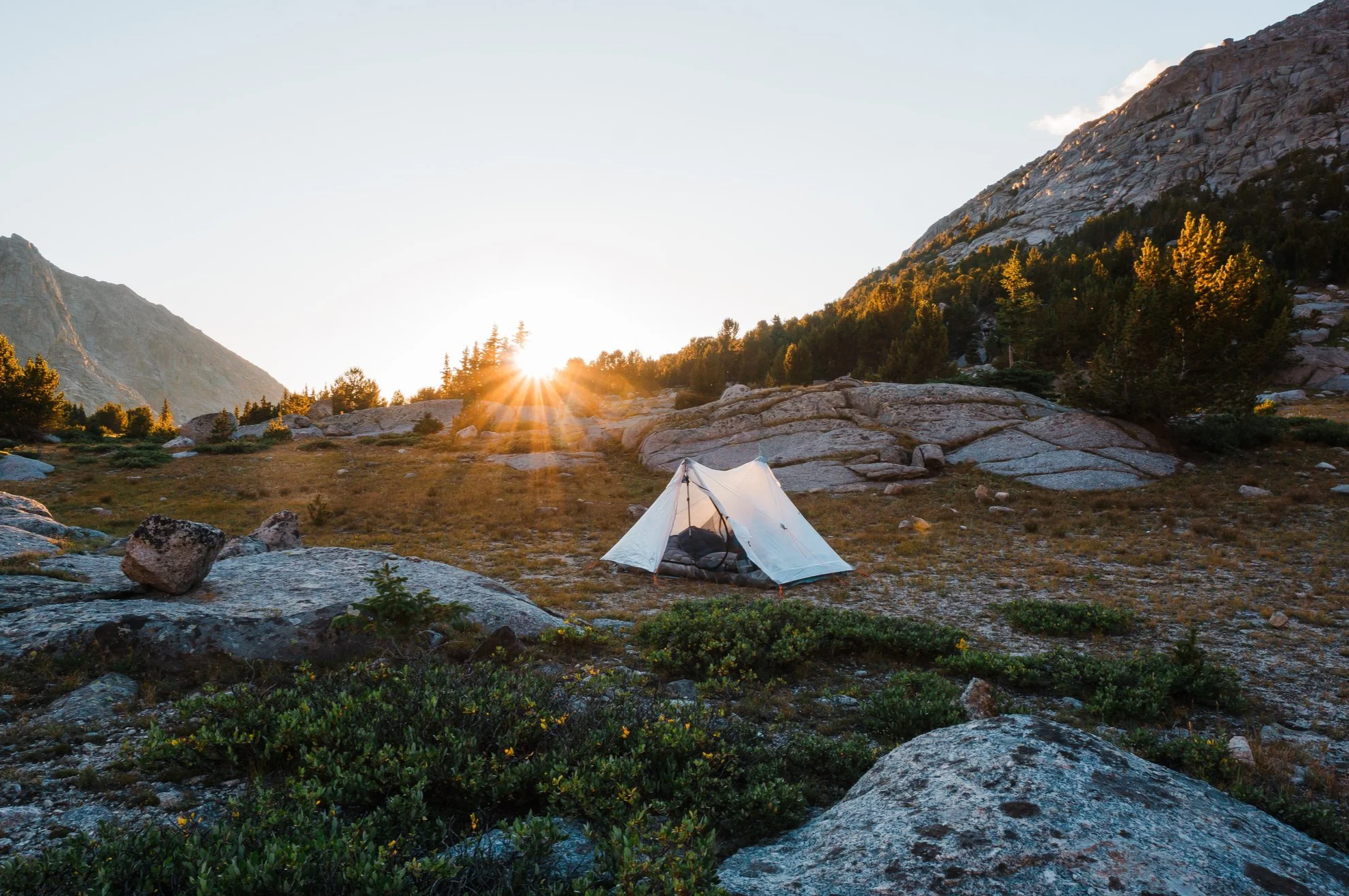 Hyperlite Mountain Gear Unbound tent pitched at an alpine campsite