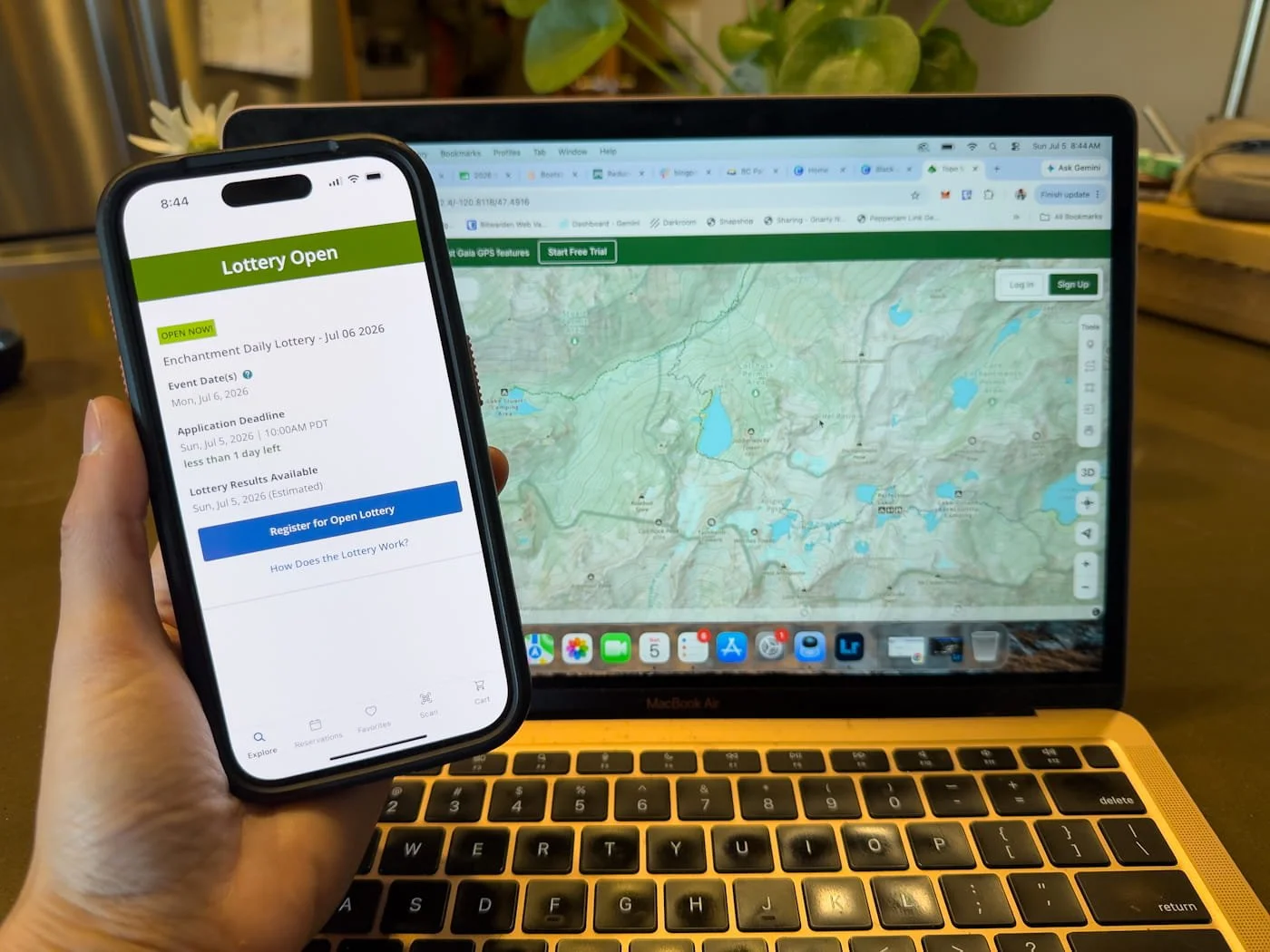 a photo of a phone with the lottery application open to apply for a daily lottery enchantments permit