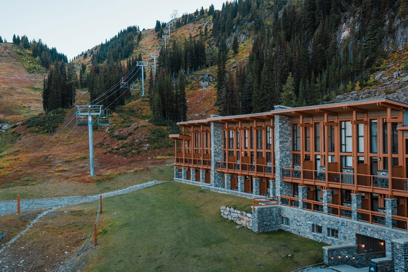 summer view of Sunshine Mountain Lodge and Standish Express chairlift