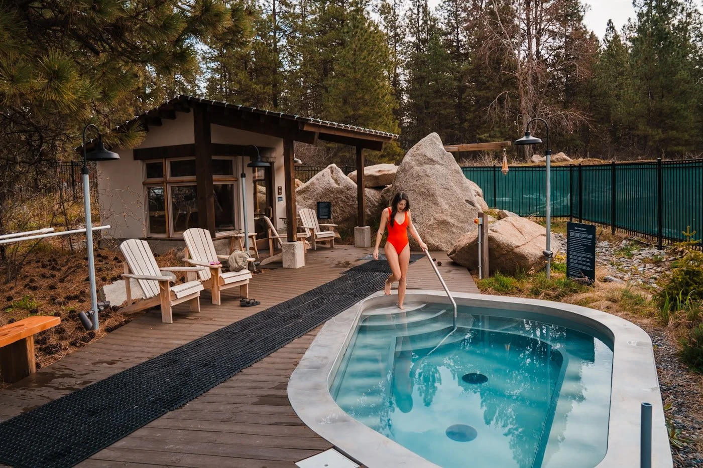 Girl walking into a cold plunge pool at The Springs Spa in Leavenworth Washington