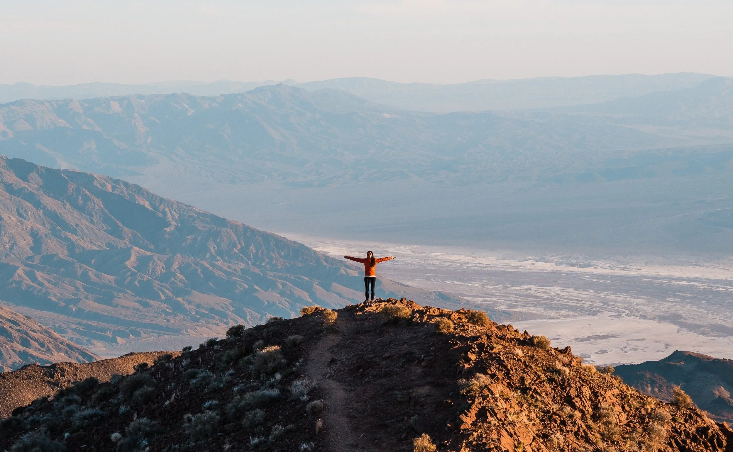 girl at dantes view at sunset in death valley NP