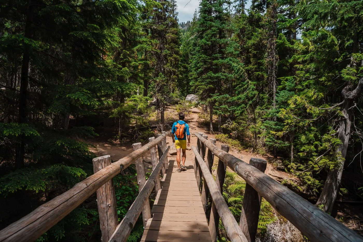bridge crossing over mountaineer creek along lake stuart trail in alpine lake wilderness enchantments