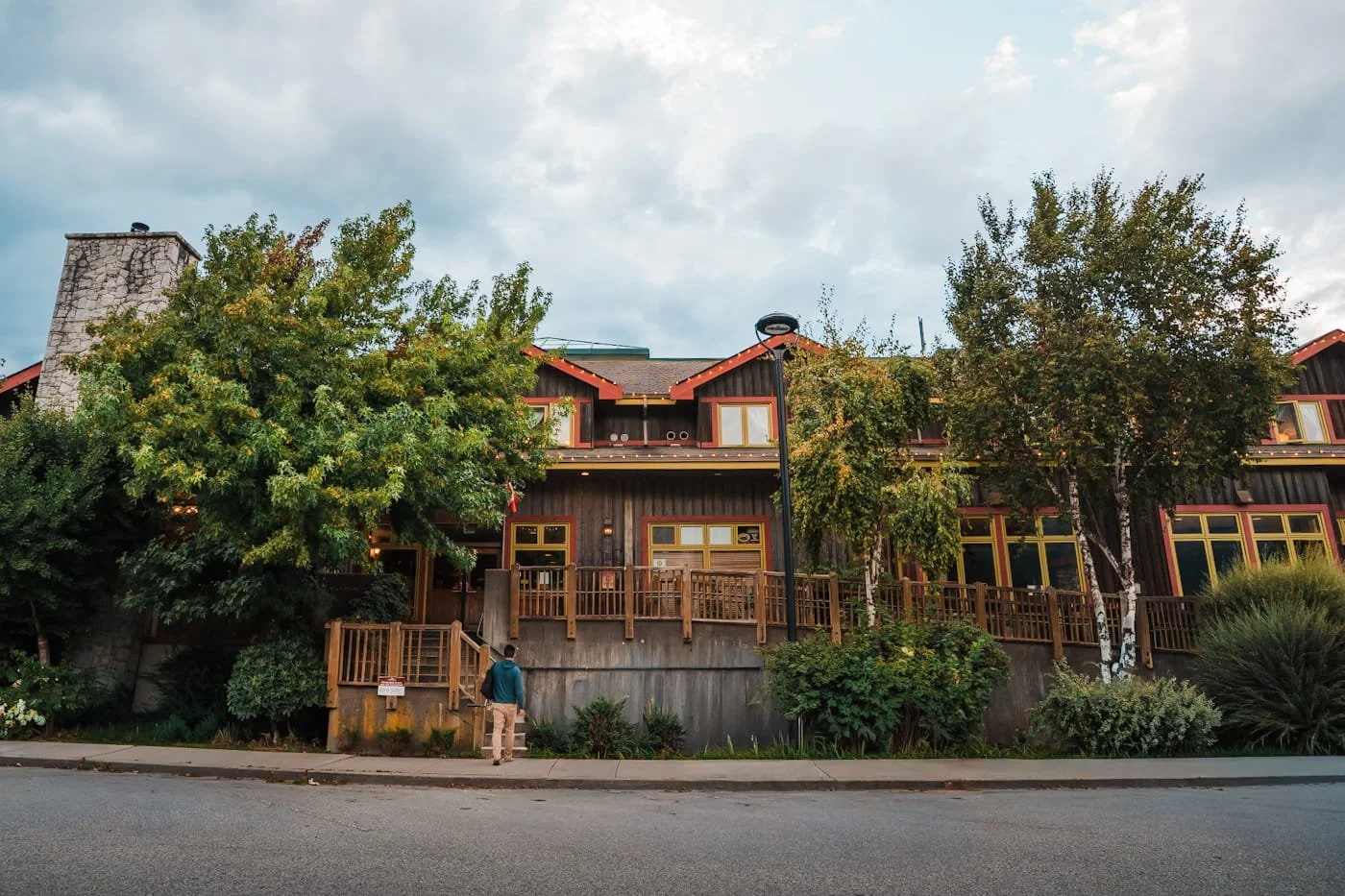 Man walking into Howe Sound Inn and Brewing in Downtown Squamish