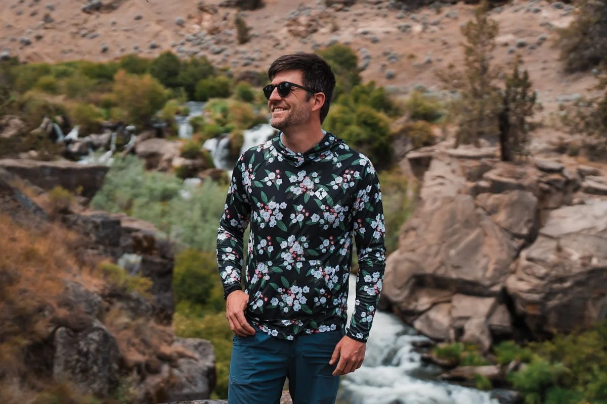 hiker wearing a town shirt co Mountain Laurel Ultralight Sun Hoodie