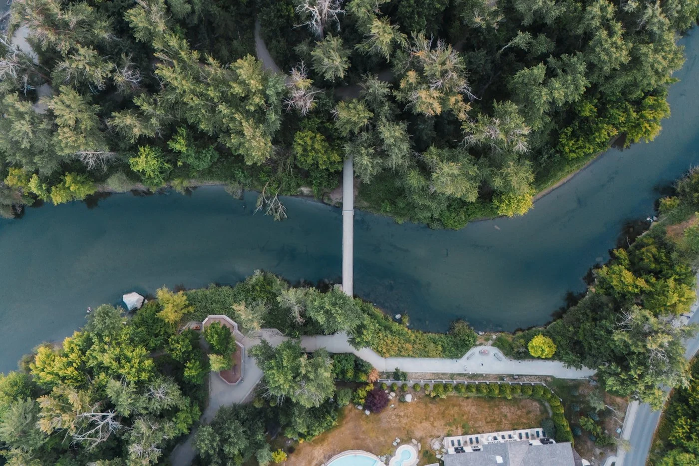 Aerial view looking down at the pedestrian bridge to blackbird island in Leavenworth Washington