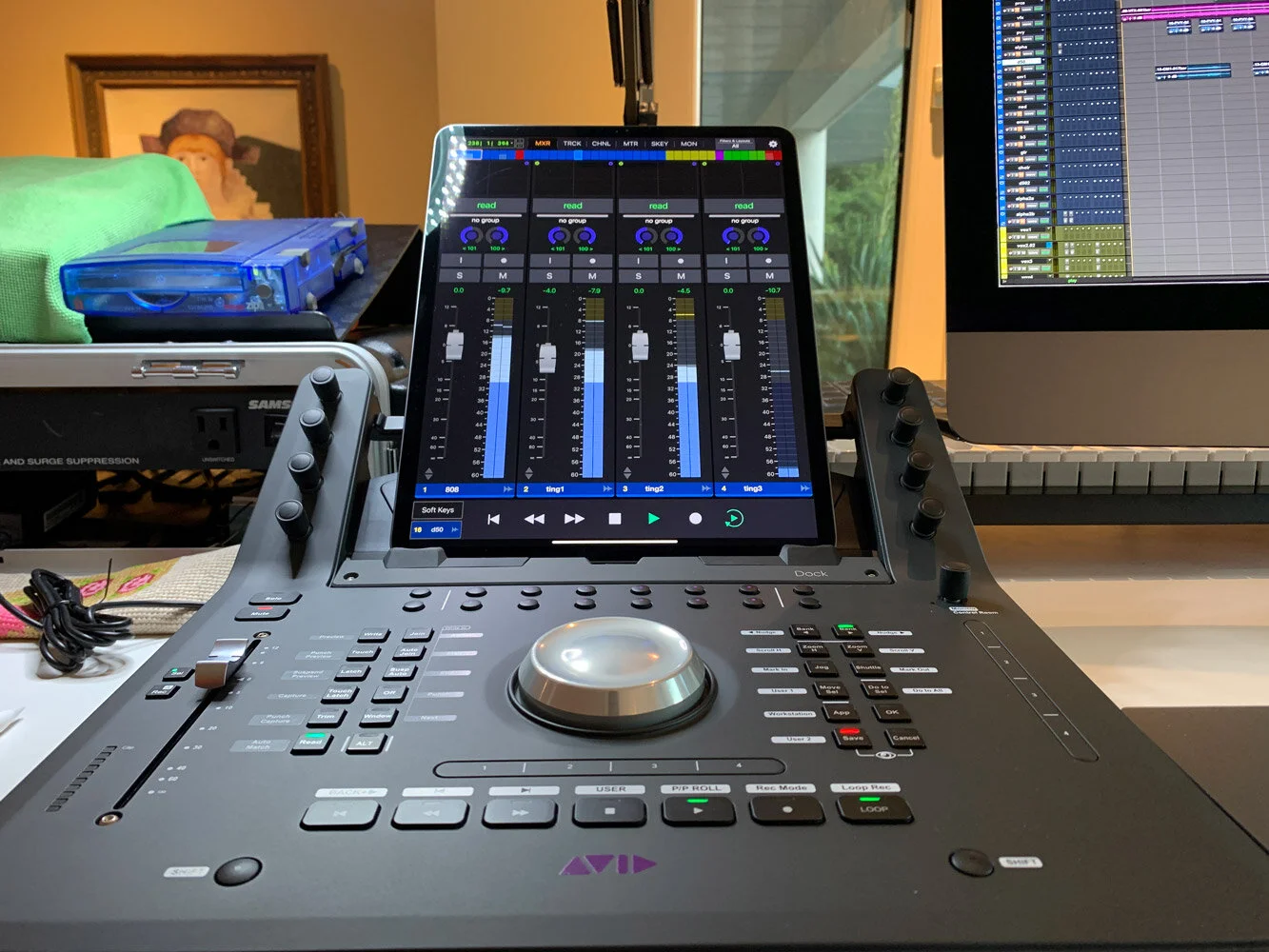 Avid audio mixing console with digital interface and control panel in a studio setup. Pro Tools. Hashmoder (Omar Hash) (Omar Hashim)
