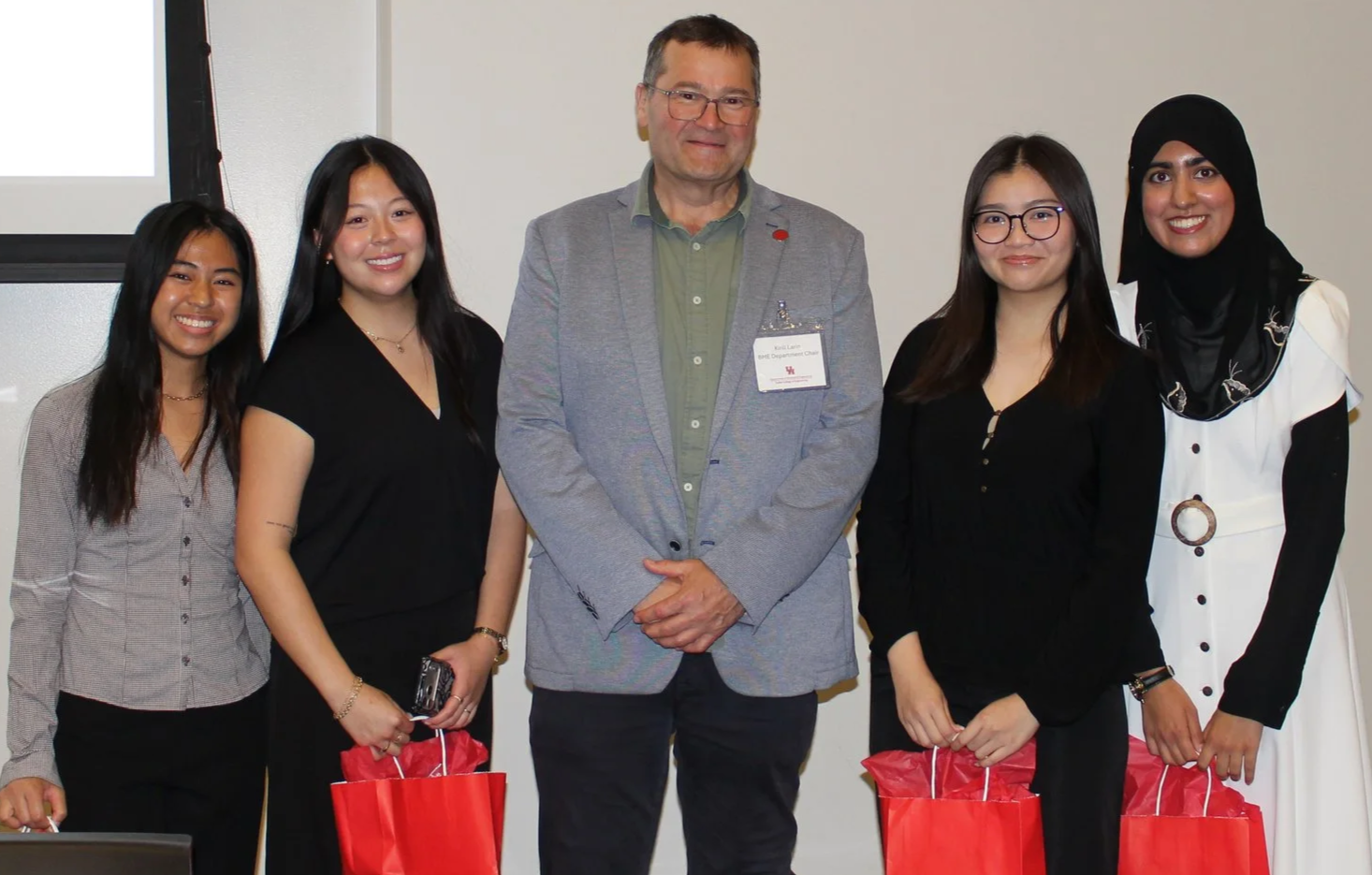 Biomedical Engineering Undergraduate Capstone Project 3-minute thesis and research poster presentation 1st place winners at 2026 BME Day with Department Chair, Dr. Kirill Larin (left to right: Tiffany Phan, Grace Byrne, Thu Nguyen, and Zoya Ahmed) (A