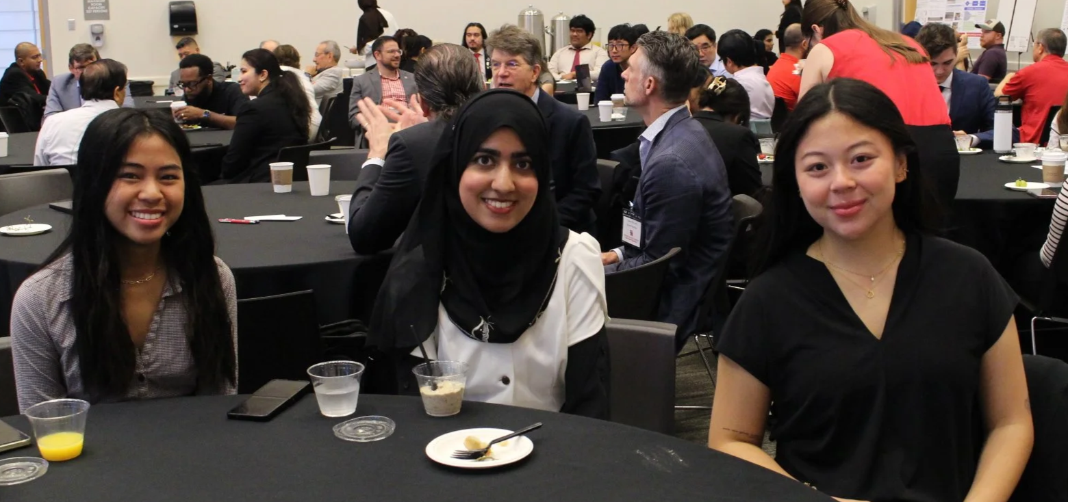 Biomedical Engineering Undergraduate Capstone Project Team Members Tiffany Phan, Zoya Ahmed, and Grace Byrne at 2026 BME Day at the University of Houston (April 24, 2026).
