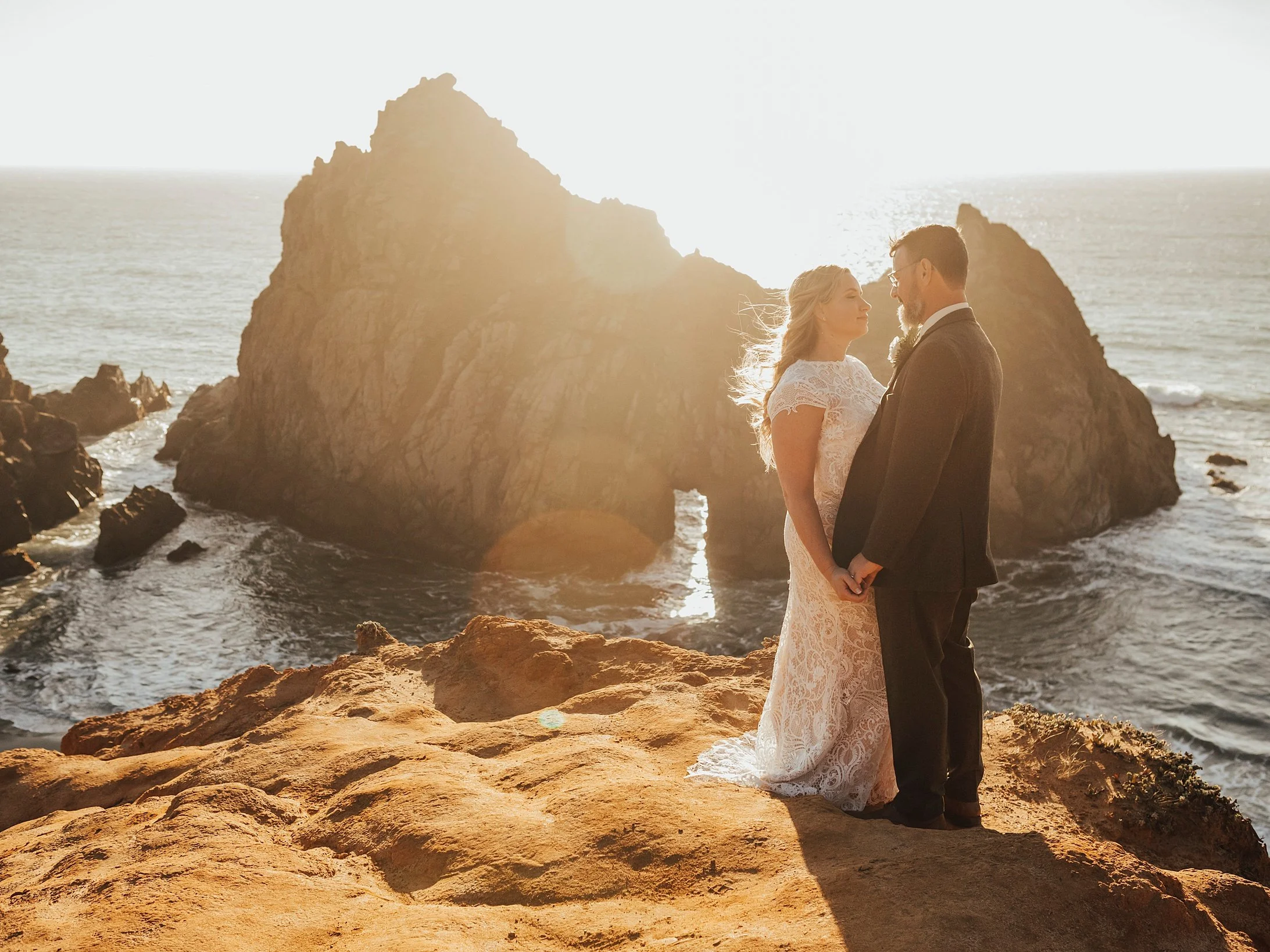     Luxury Big Sur wedding photography with dramatic ocean waves and coastal scenery