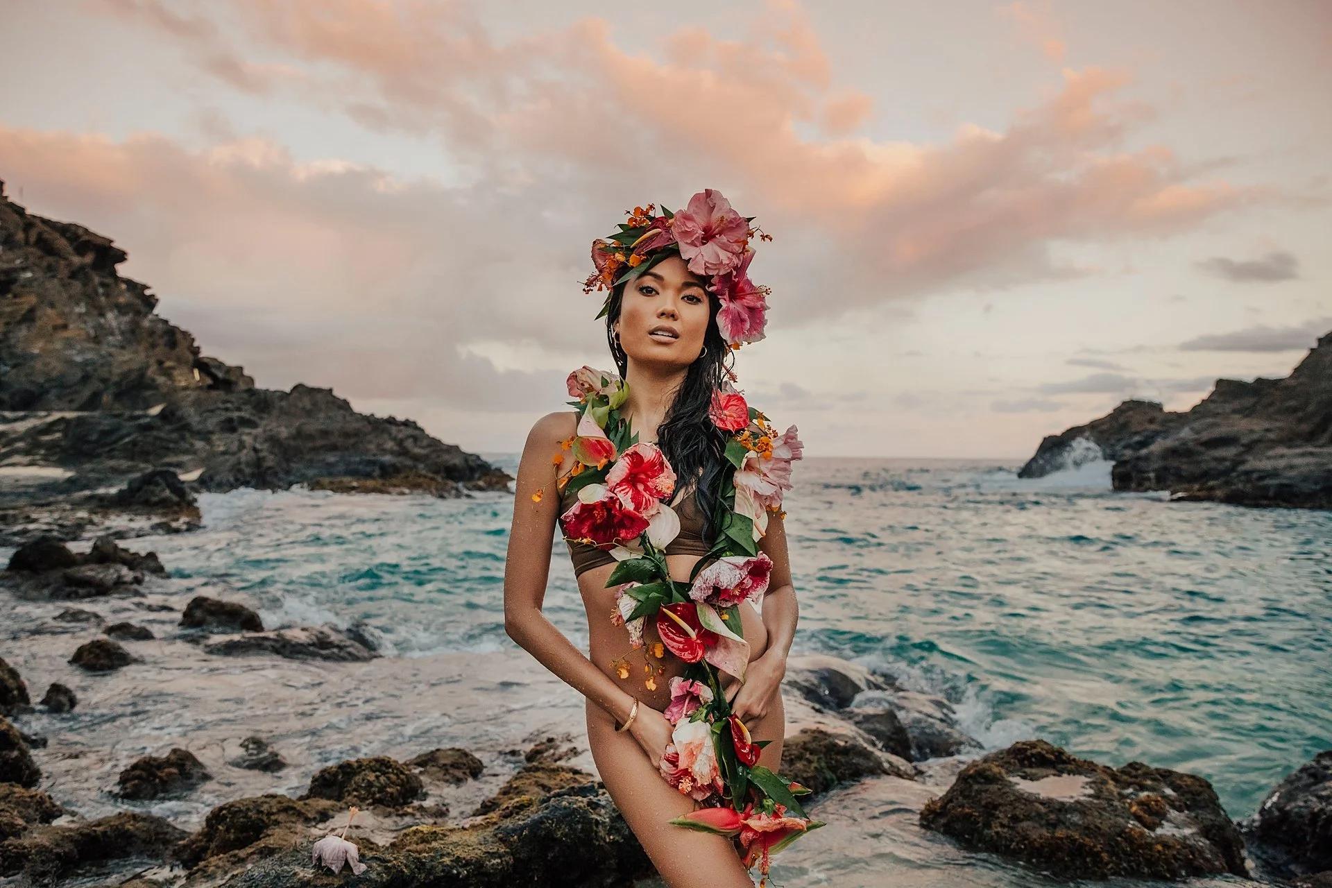     Artistic Hawaii portrait session with feminine floral styling and editorial composition