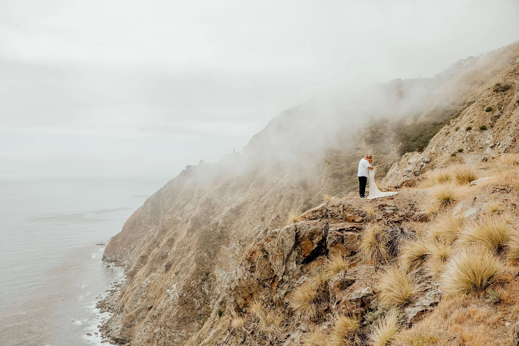     Cinematic coastal wedding portraits captured along the Big Sur coastline