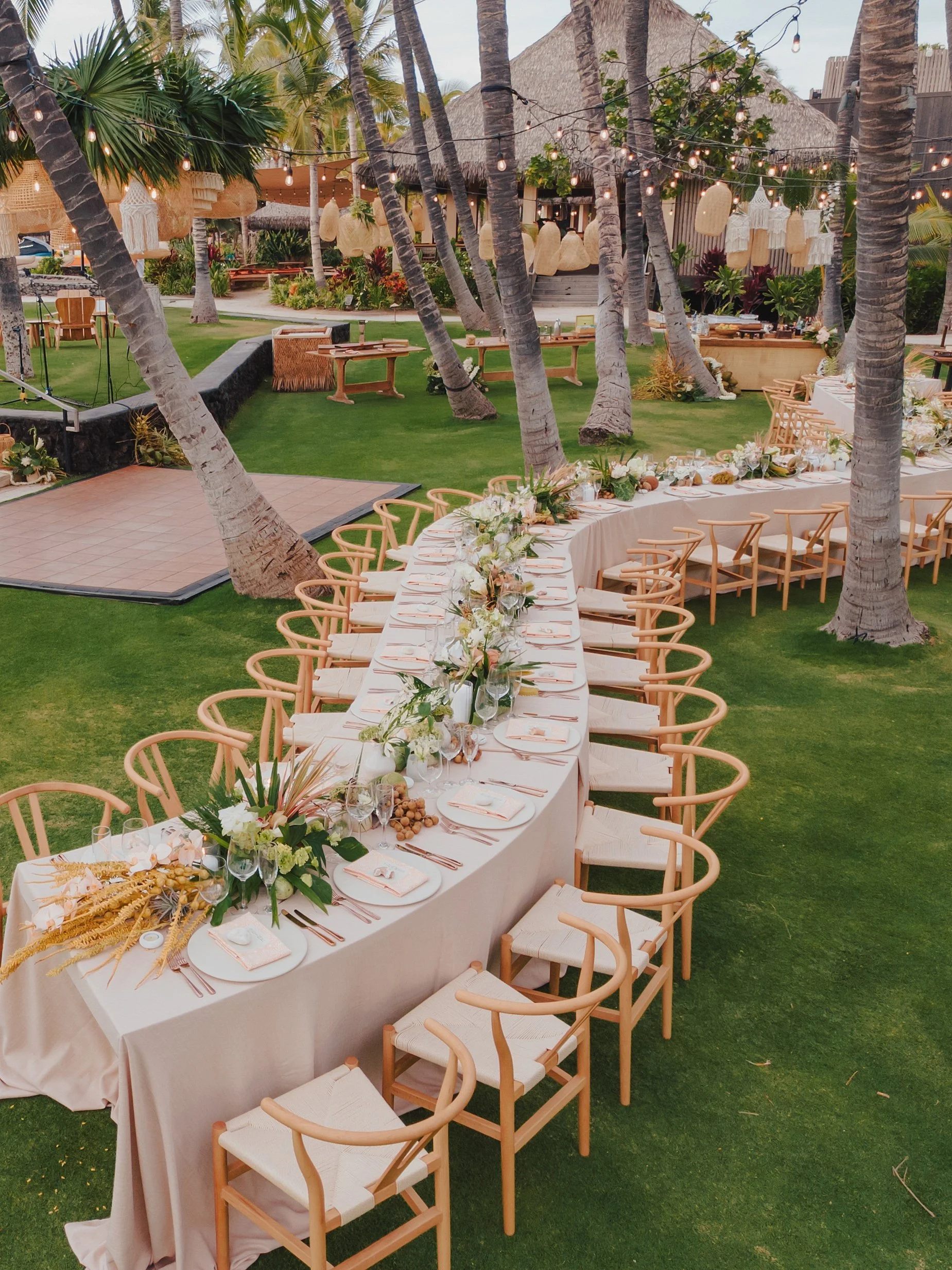     Luxury reception decor with candlelight and island-inspired wedding design at Konan Village in Hawaii