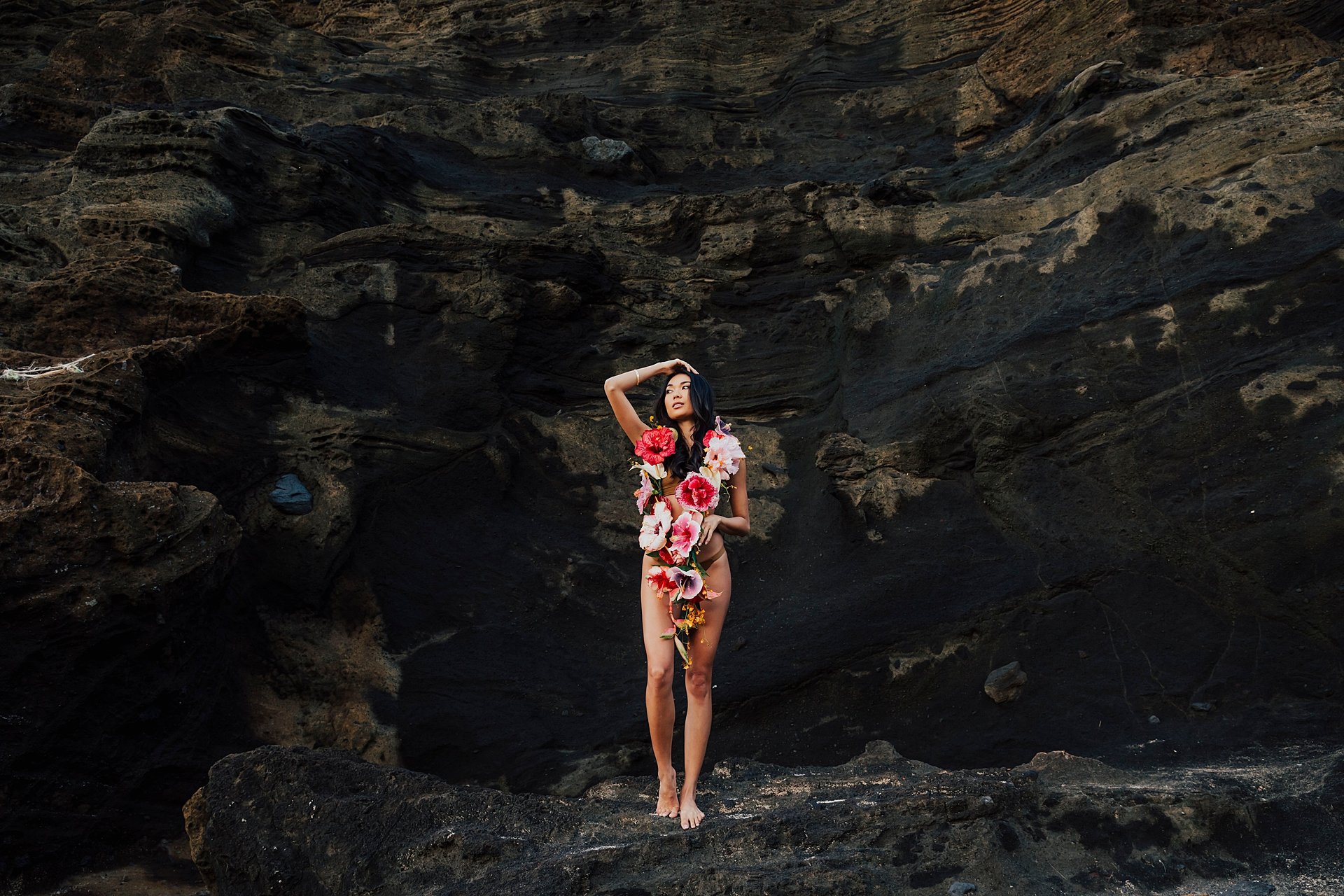     Luxury Hawaii portrait session blending florals, ocean textures, and artistic storytelling