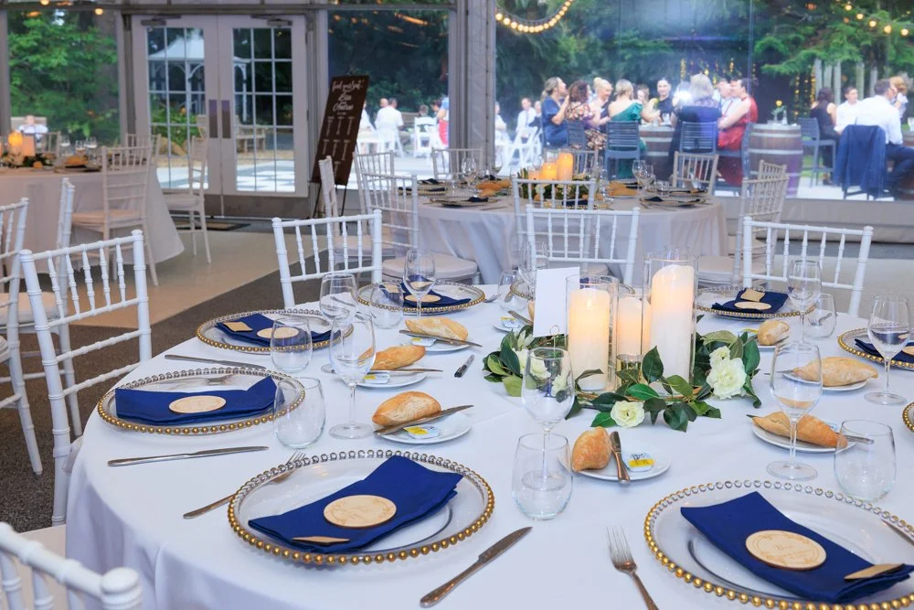 in-the-grove-marquee-reception-table-styling-navy-gold.jpg