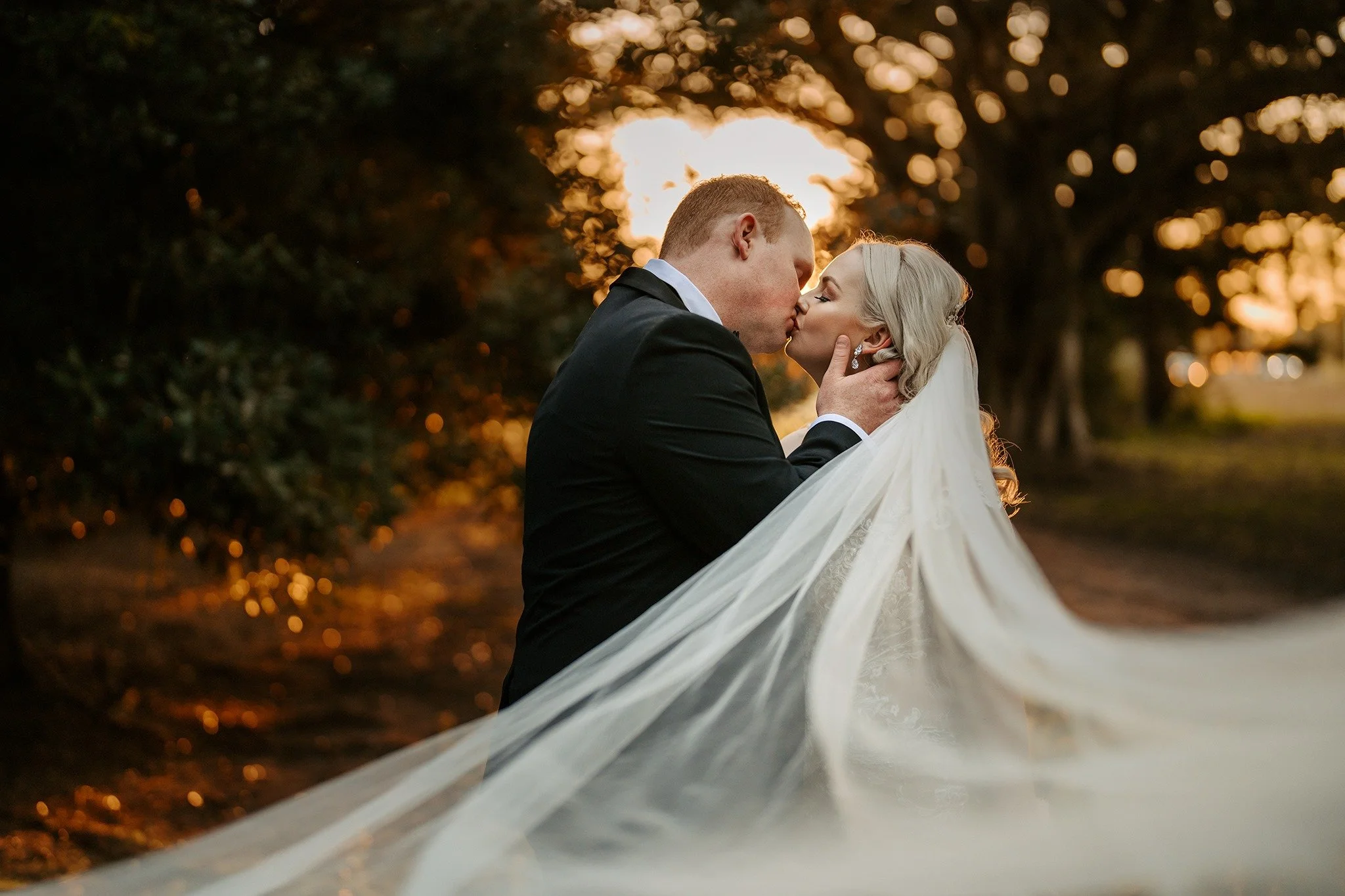 Romantic golden hour wedding portrait in garden setting Queensland