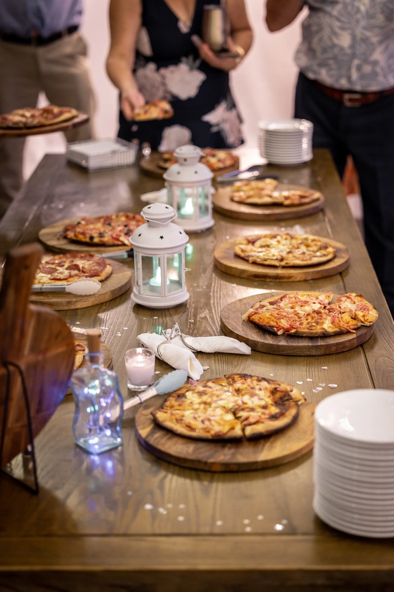 Woodfired pizzas served as share-style catering for a relaxed wedding reception.