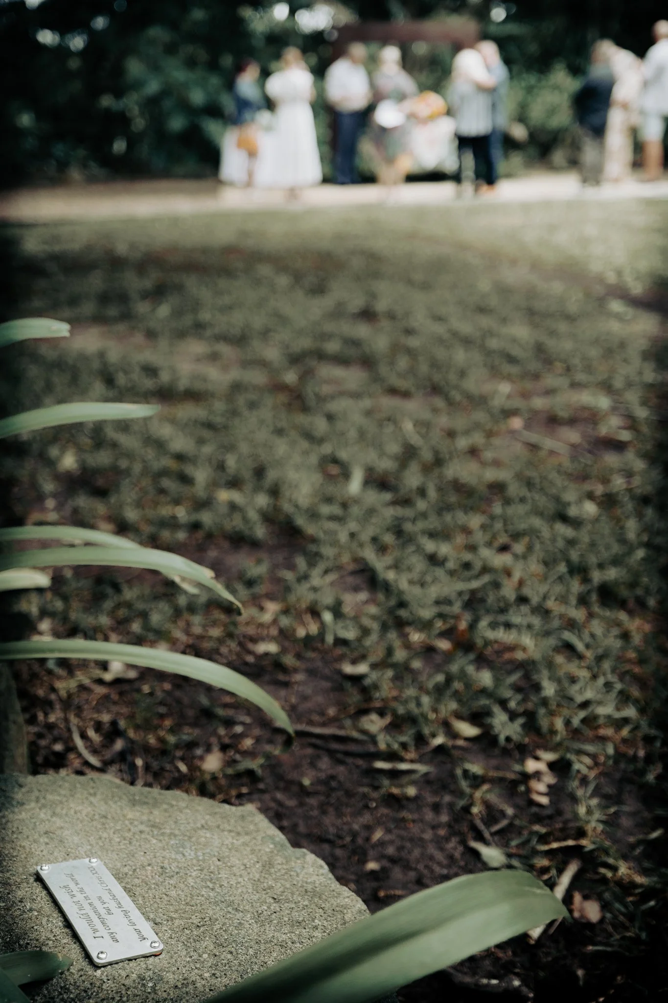 Memorial plaque at In The Grove representing the meaningful celebrations, gatherings and special events hosted in the garden venue.